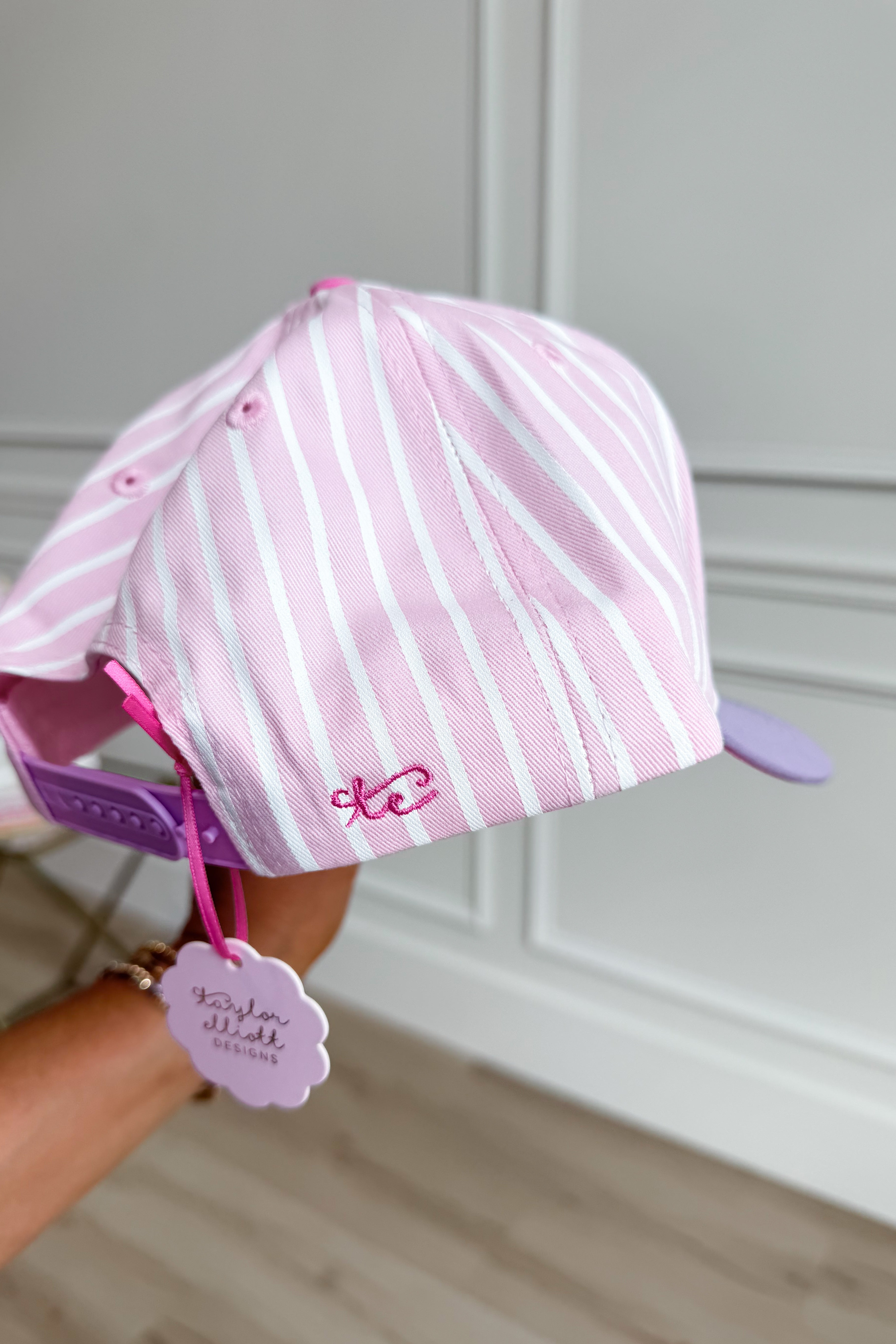 Taylor Elliot Designs Saved By Grace baseball hat, stylish 217 hair accessory with a curved brim and adjustable strap.