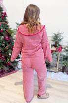 PEACH LOVE Nicholas Gingham Santa embroidered pajama pants with festive red and white pattern, relaxed fit, and elastic waistband.