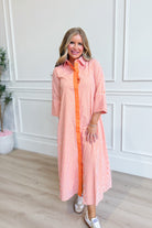 TCEC Aly striped button-down midi dress with long sleeves and a fitted waist, featuring a stylish knee-length design.