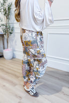 EASEL Cody mixed print patchwork pants, 156 pants style, featuring colorful patchwork fabric and relaxed fit.