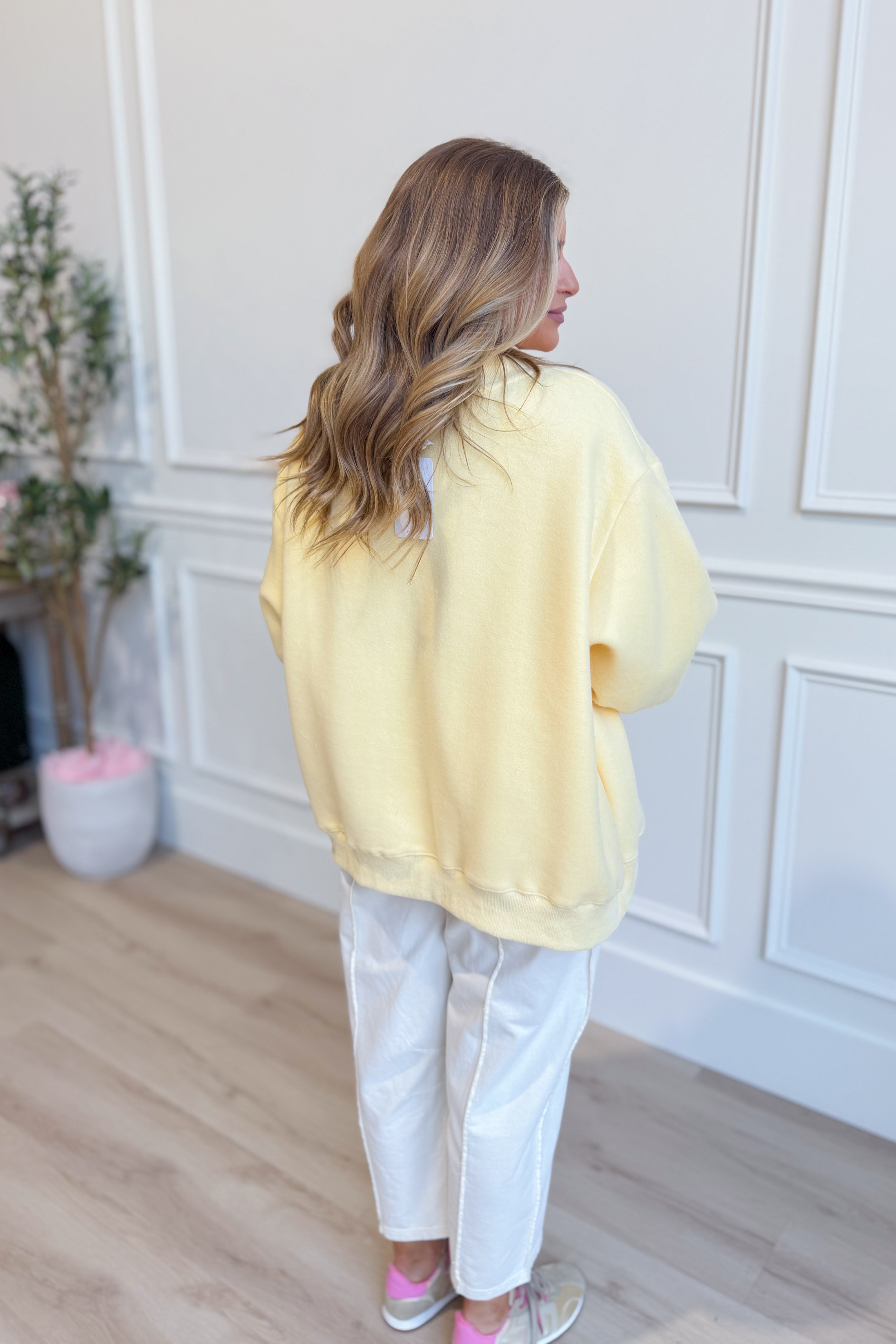 Reversible mock neck sweatshirt from BUCKET LIST's Lolly Gag Dilly Dally 137 Graphic Sweatshirts collection, featuring colorful graphic design.