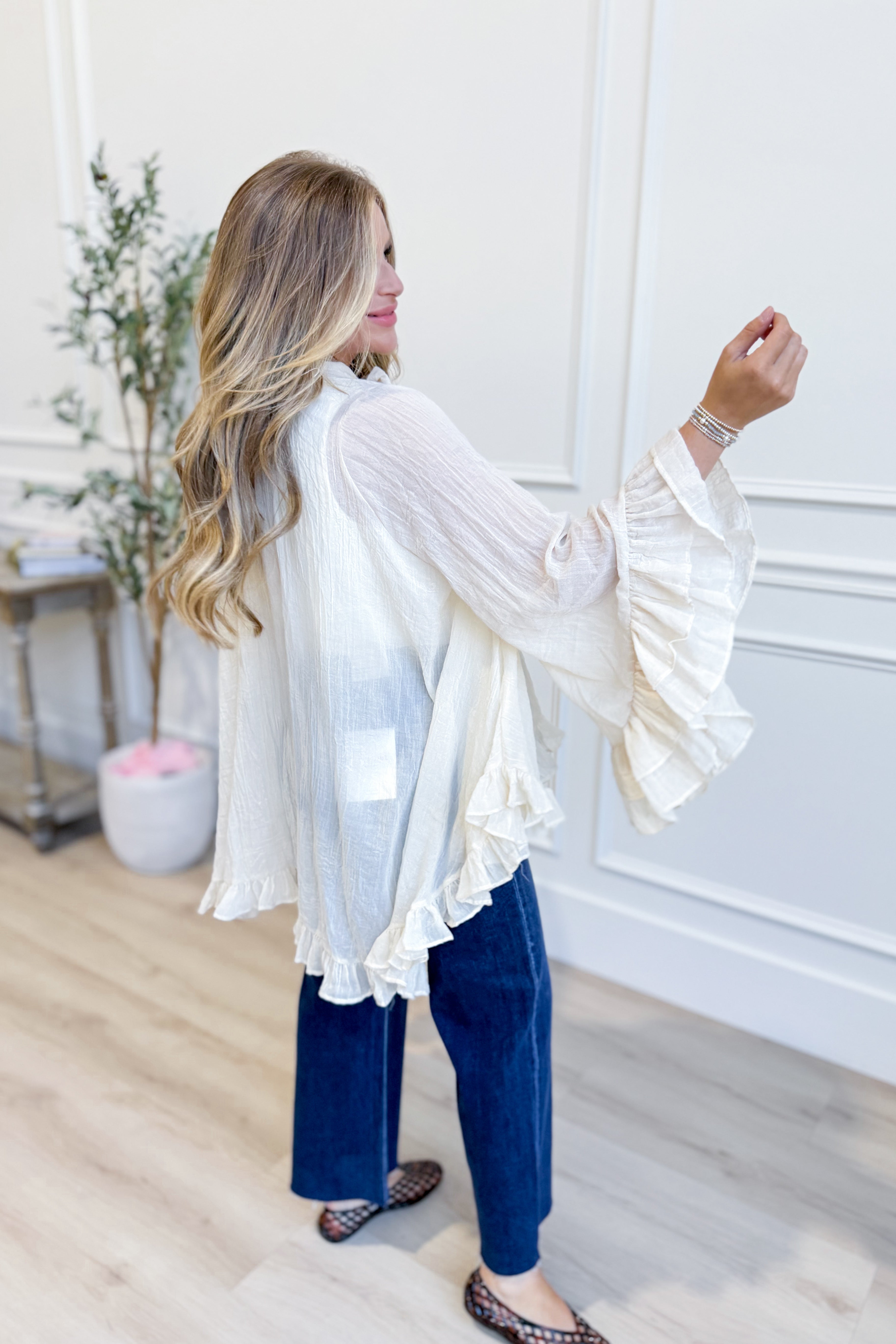 Kimmie tie-neck ruffle top from TCEC, a stylish 110 dressy blouse with ruffle details and a tie-neck design.