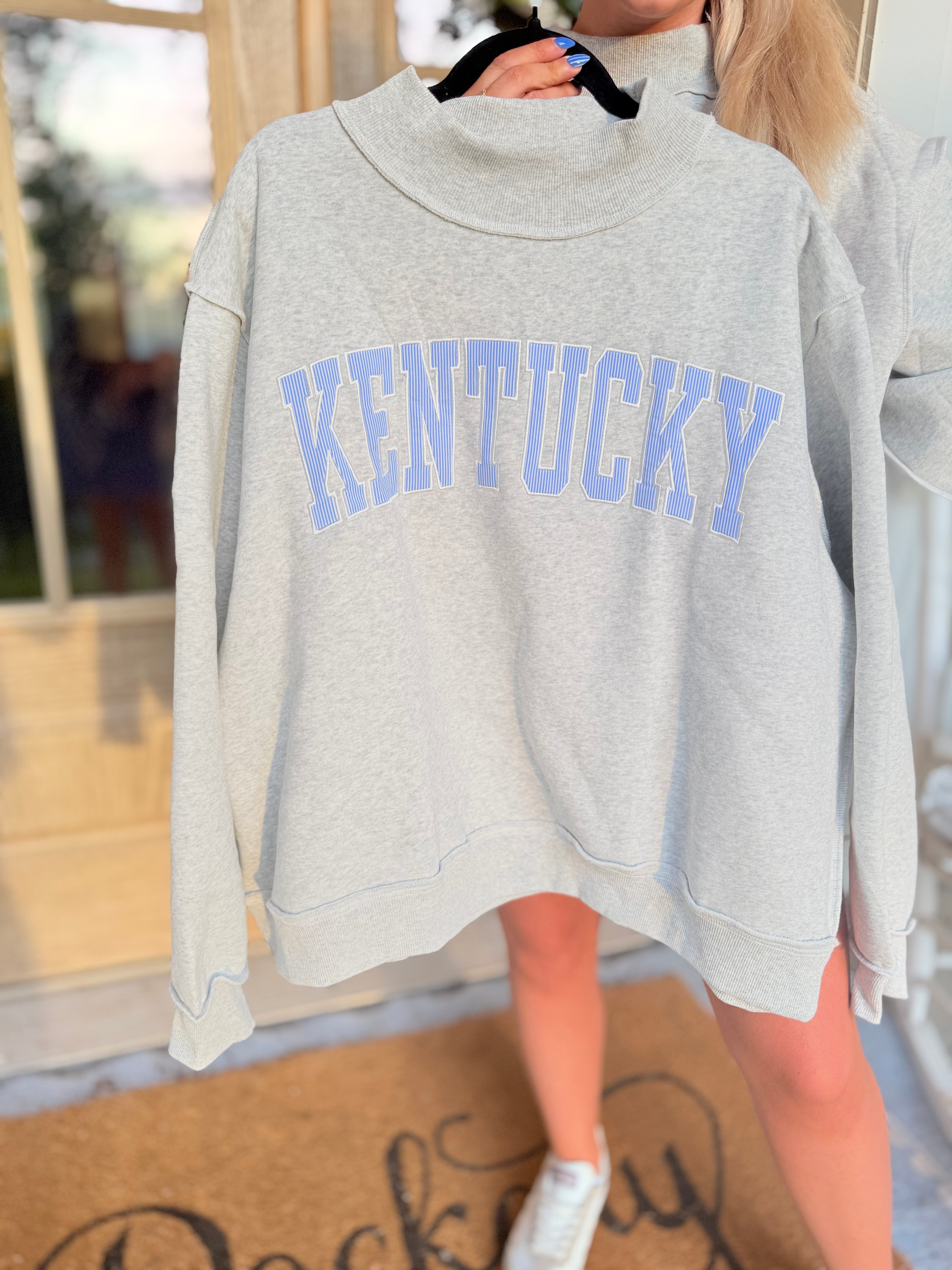Kentucky Blue striped mock embroidered graphic sweatshirt by BUCKET LIST featuring a casual design and bold stripe pattern.