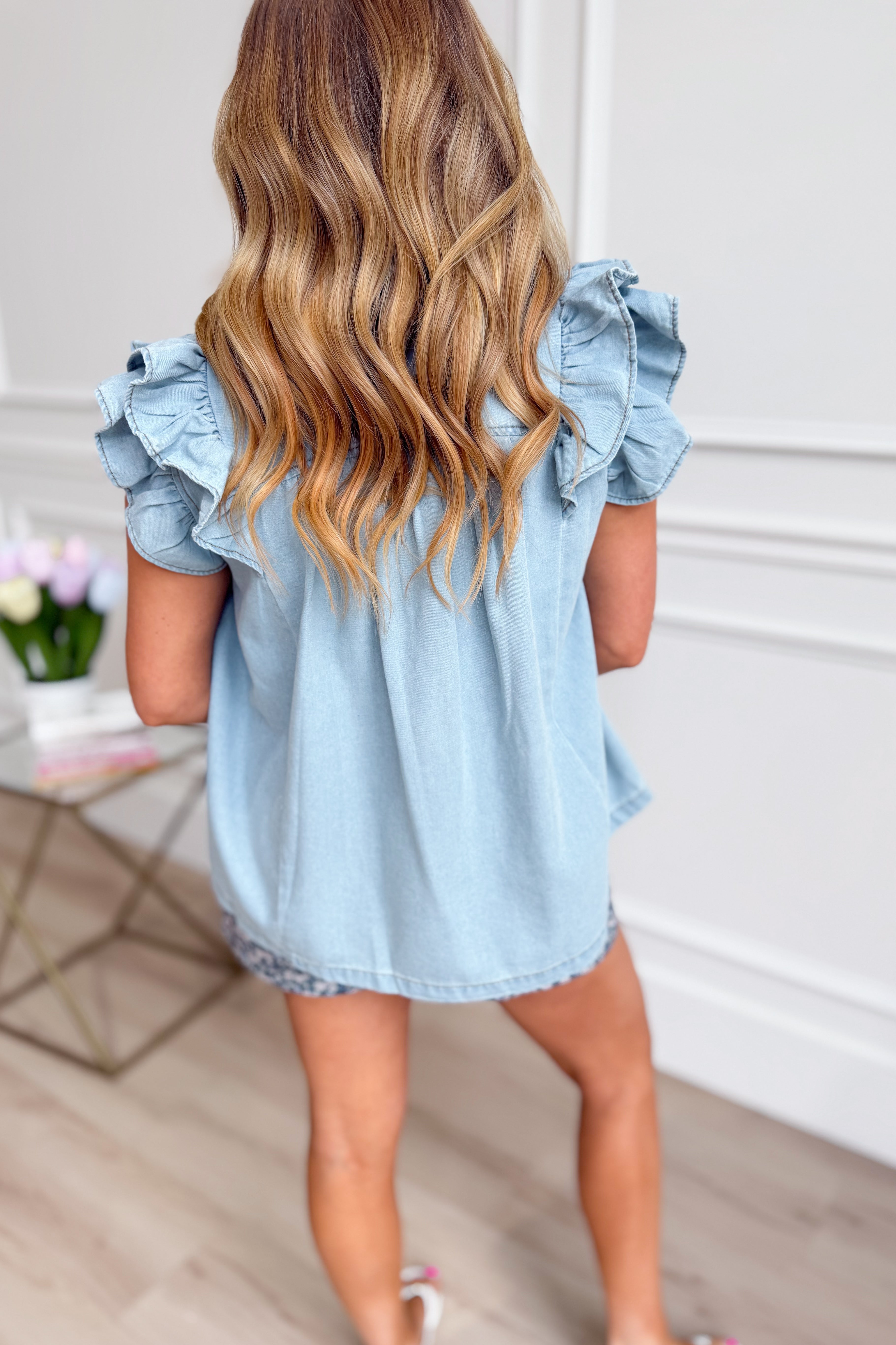 UMGEE USA Bren Frilled Chambray Top, casual women's top with ruffled neckline and chambray fabric, front view.