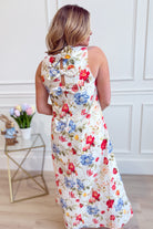 ENTRO Zoe red botanical floral midi dress with elegant flowy fabric and vibrant floral pattern, perfect for dressy occasions