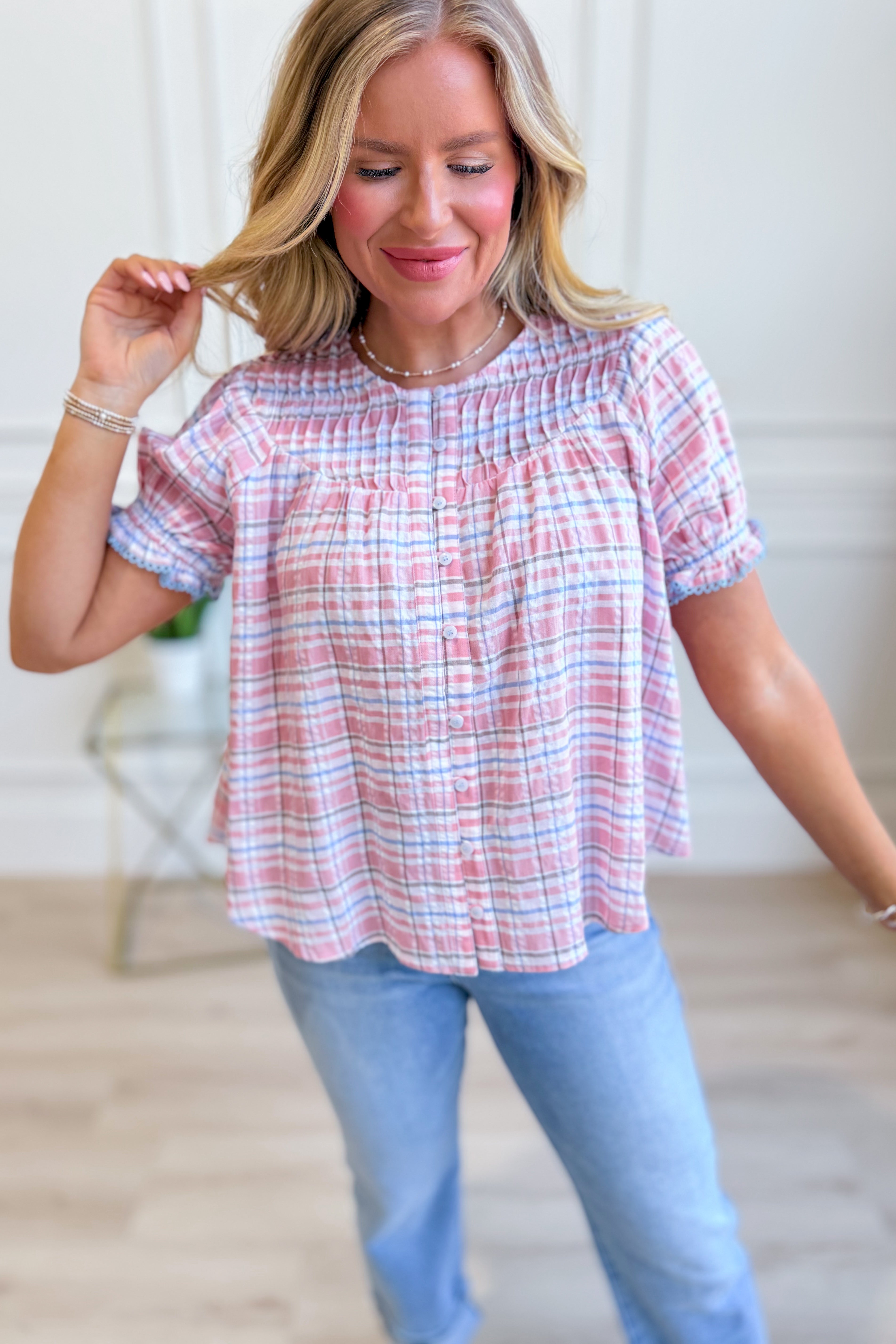EE:SOME Petunia Plaid Button Down Blouse, a stylish dressy top with a plaid pattern, perfect for casual or semi-formal wear.