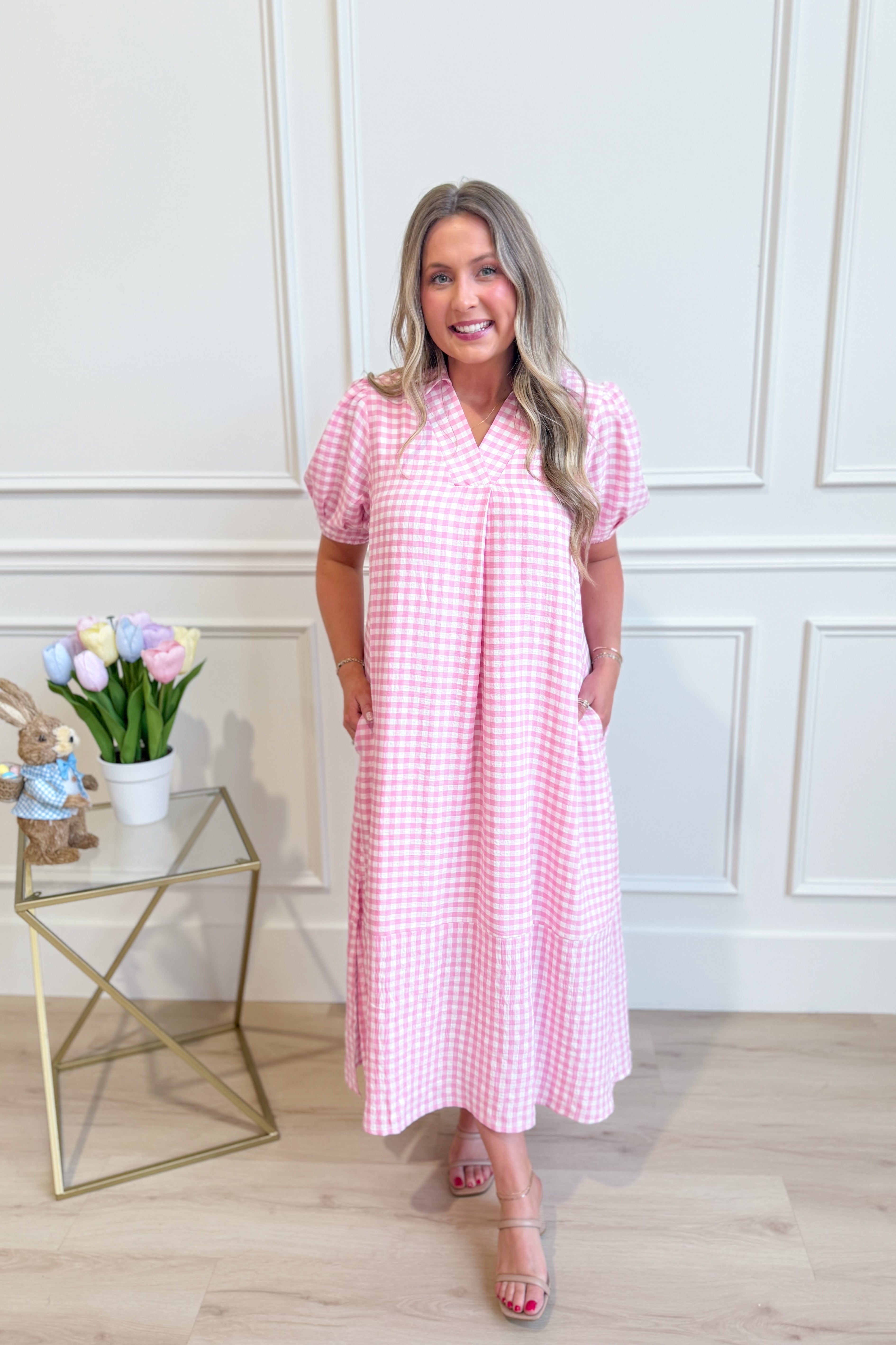 Umgée USA Tonya plaid printed midi dress with long sleeves and a fitted waist, featuring a stylish plaid pattern.