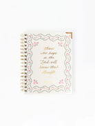 Mary Square devotional journal with floral cover and lined pages, designed for daily reflections and spiritual growth.