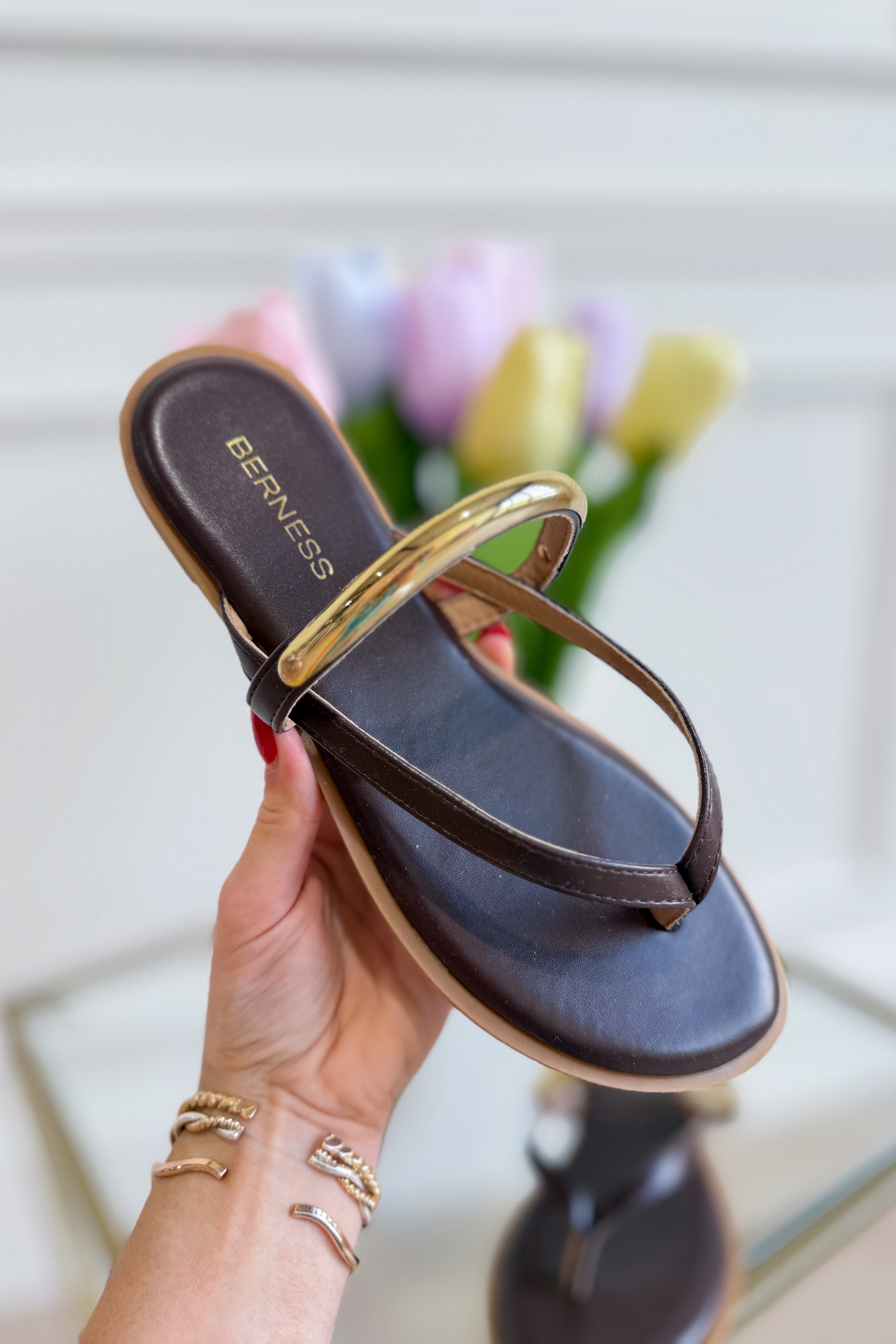 Berness Kara Coffee Sandal featuring a stylish open-toe design and comfortable flat sole, perfect for casual summer wear.