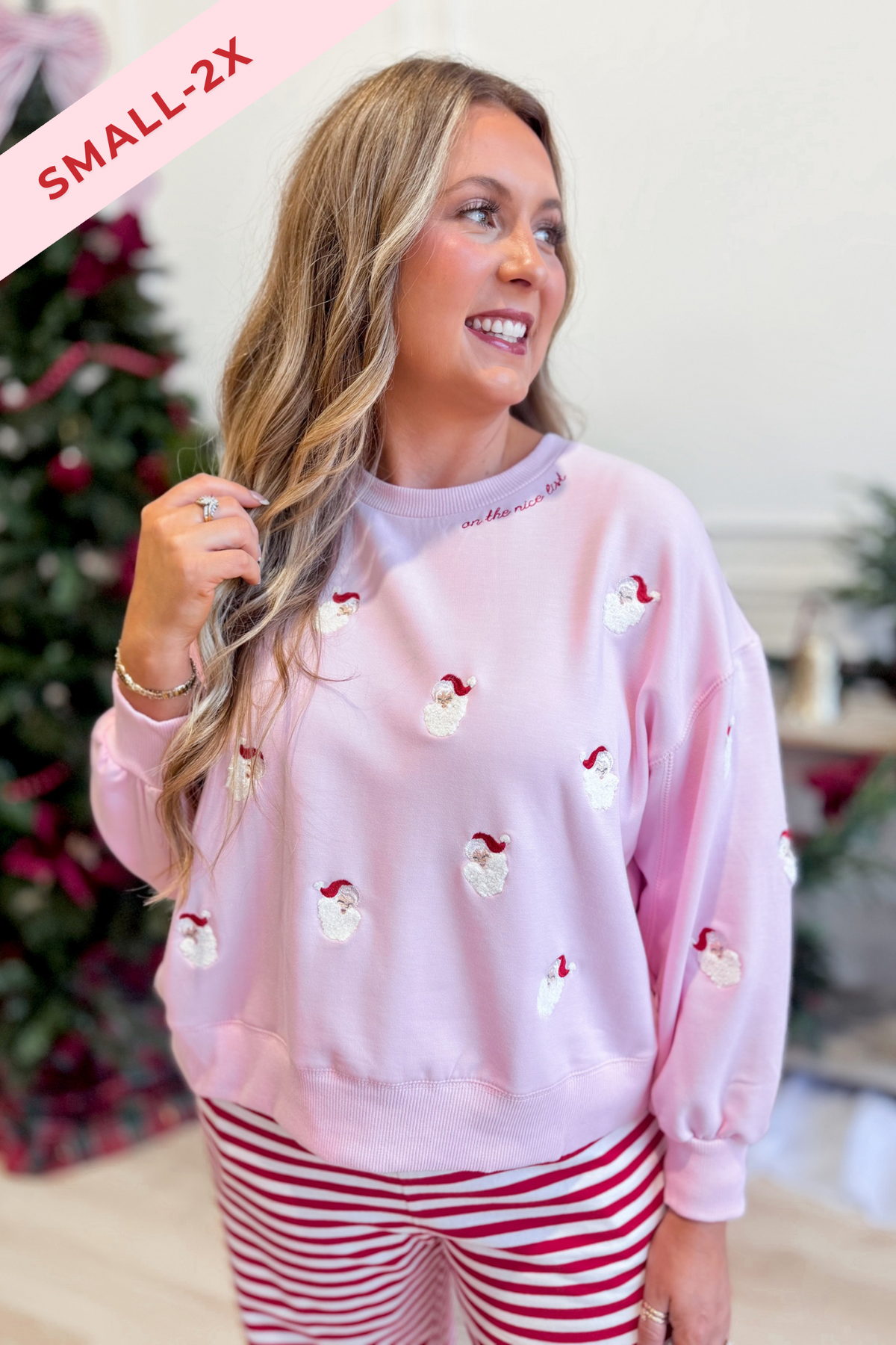 Mary Square Millie Pink Santa pullover sweatshirt with festive graphic design