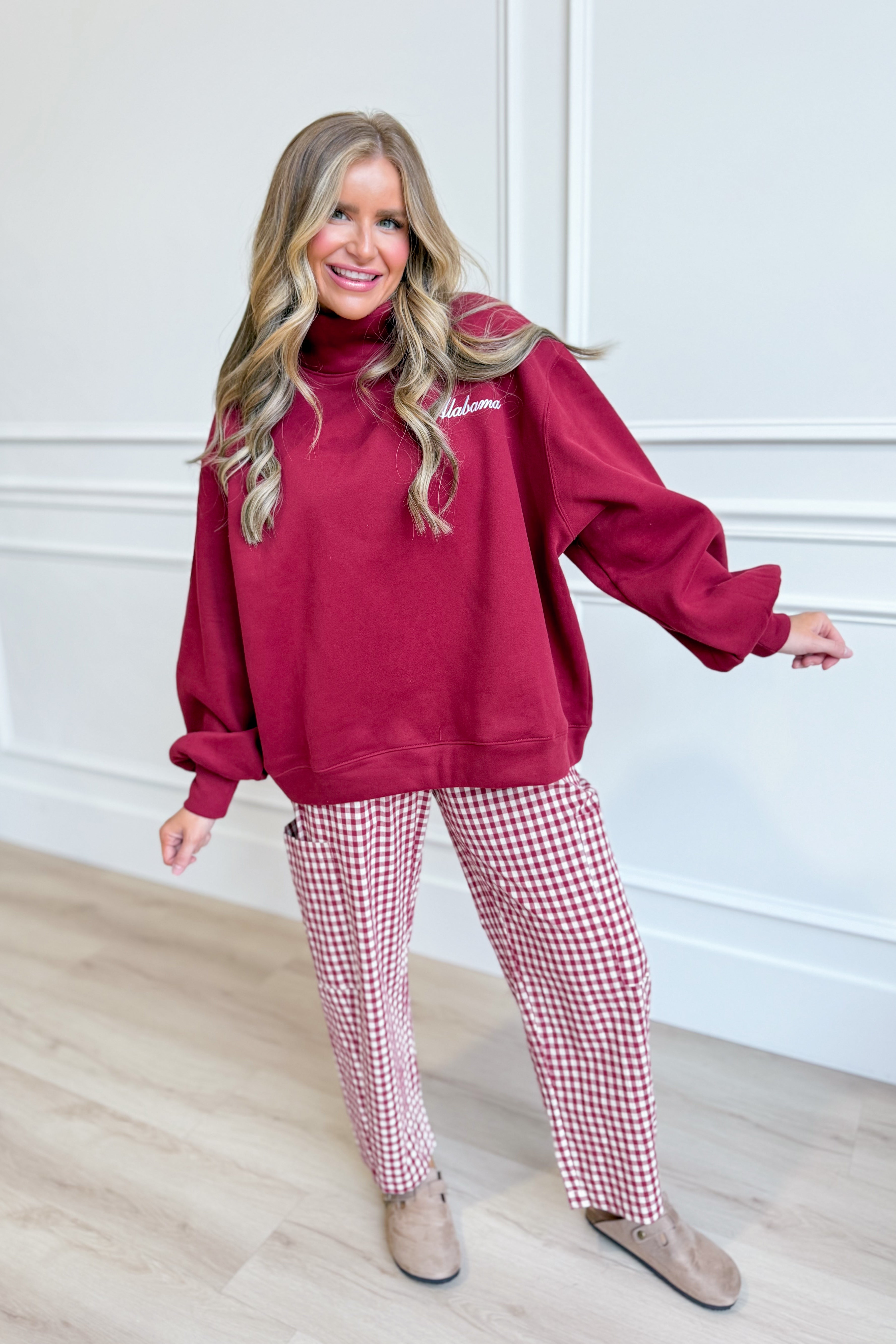 Crimson mock neck sweatshirt from BUCKET LIST's 137 Graphic Sweatshirts collection, featuring a rolled design and graphic details.
