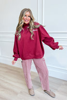 Crimson mock neck sweatshirt from BUCKET LIST's 137 Graphic Sweatshirts collection, featuring a rolled design and graphic details.