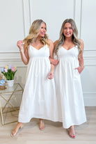 WISHLIST Rita Cami Casual Midi Dress in a flowy, sleeveless design with a fitted waist and midi length, perfect for everyday wear.