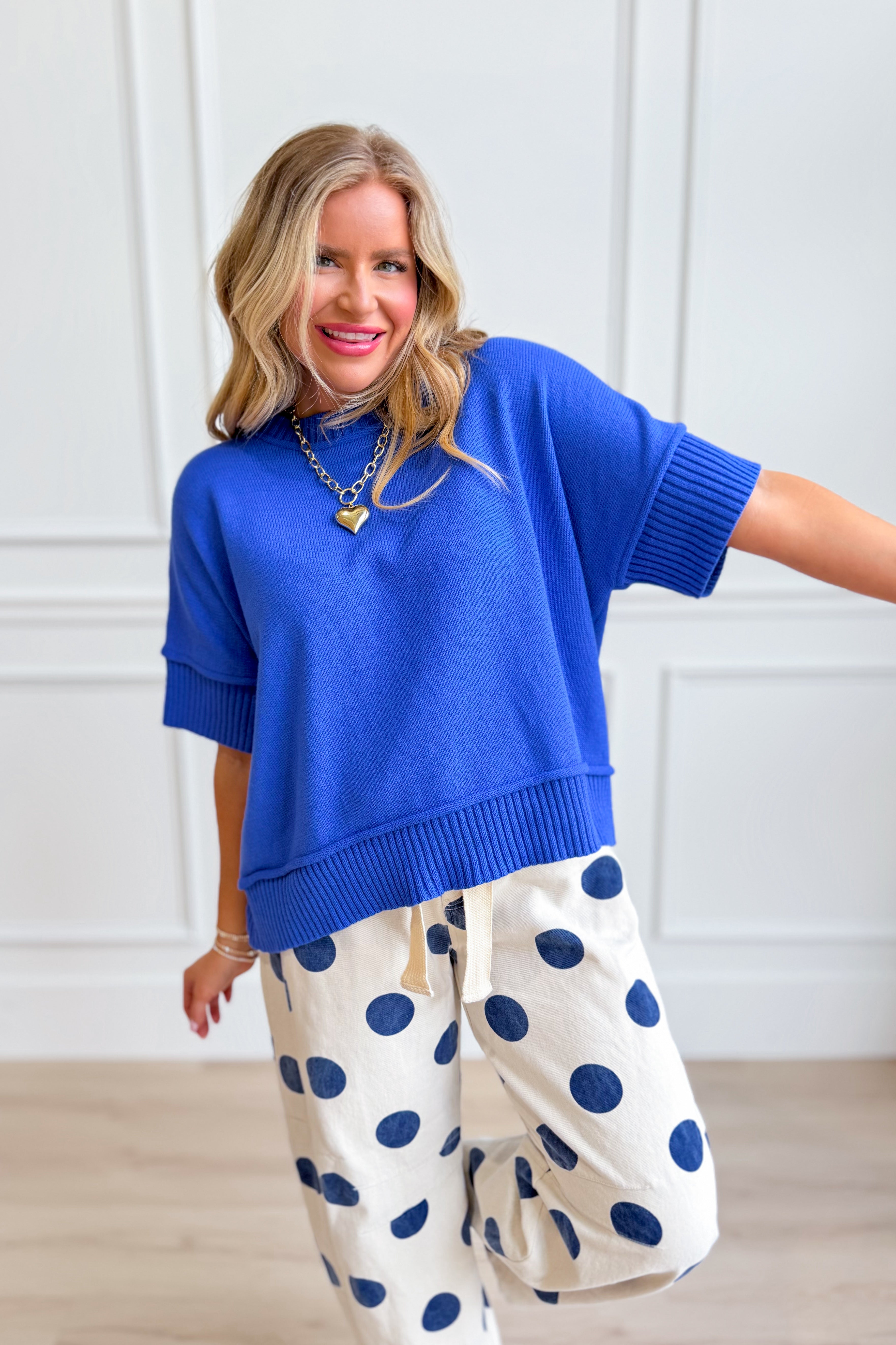 Collins Cobalt Blue Solid Casual Sweater by SHE + SKY, featuring a relaxed fit and soft knit fabric suitable for spring.