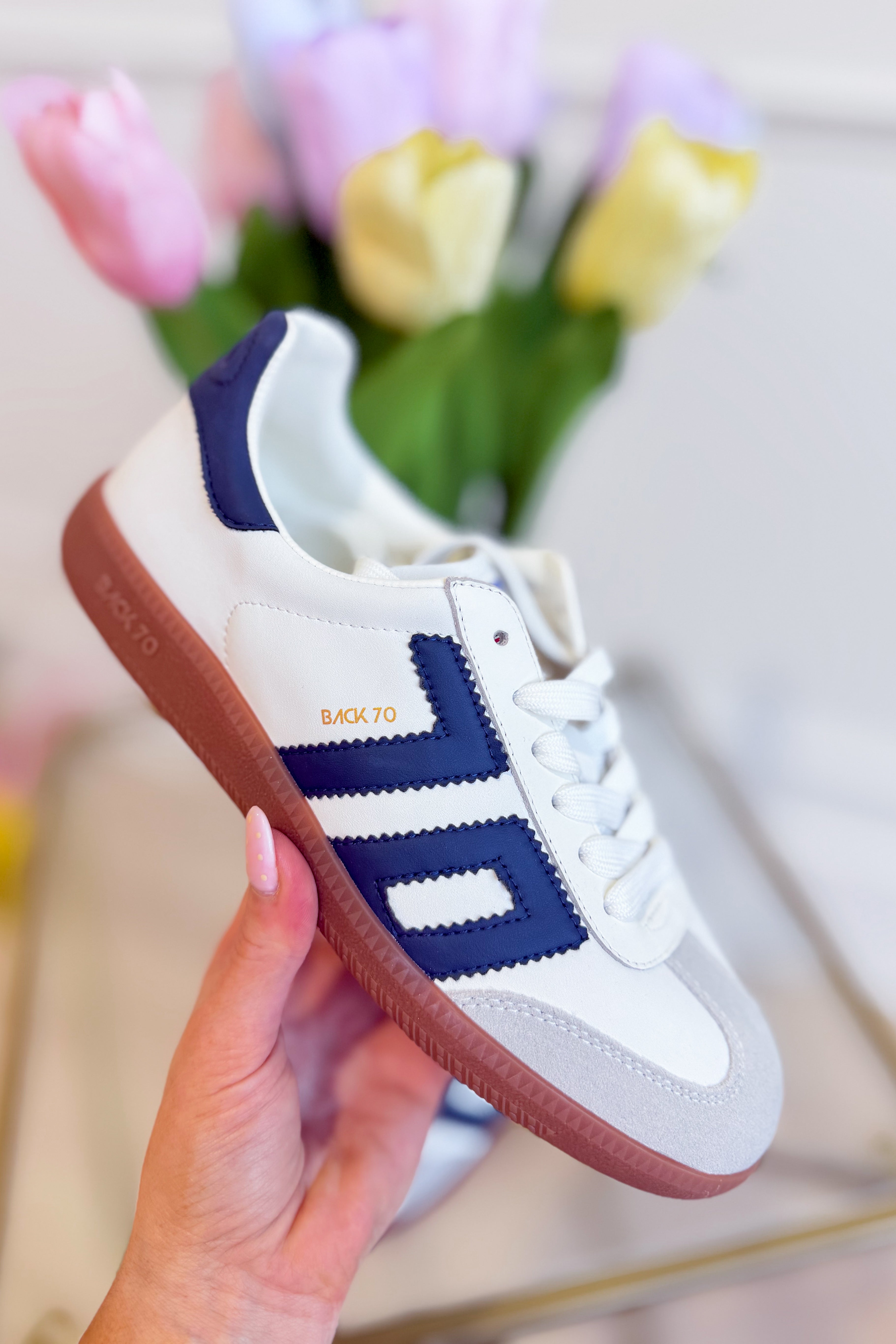 BACK 70 Cloud Sneakers in white navy featuring a sleek, modern design with breathable material and stylish laces.