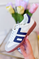 BACK 70 Cloud Sneakers in white and navy, 205 style, showcasing the casual sneaker with cloud-inspired design and color details.