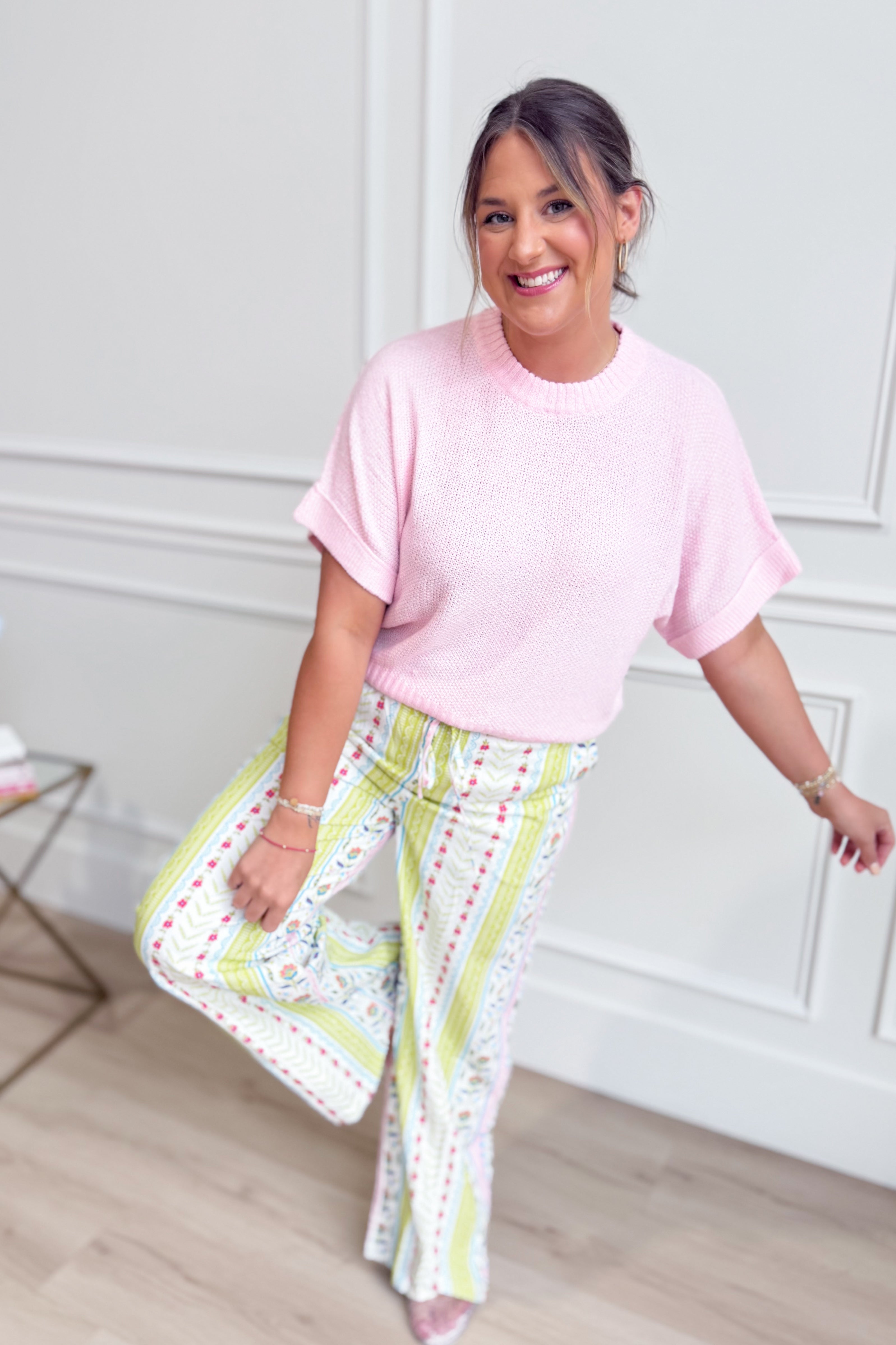 Pink knitted short sleeve top from ENTRO's Brianna Spring collection, featuring a stylish, lightweight design for spring wear.