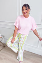 Pink knitted short sleeve top from ENTRO's Brianna Spring collection, featuring a stylish, lightweight design for spring wear.
