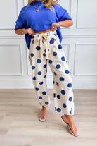 Peach Love Logan Polka Dot Barrel Jeans in novelty denim with a relaxed fit and stylish polka dot pattern.