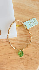 Enewton 3mm Classic Birthstone bracelet featuring a delicate silver chain and a colorful birthstone charm.