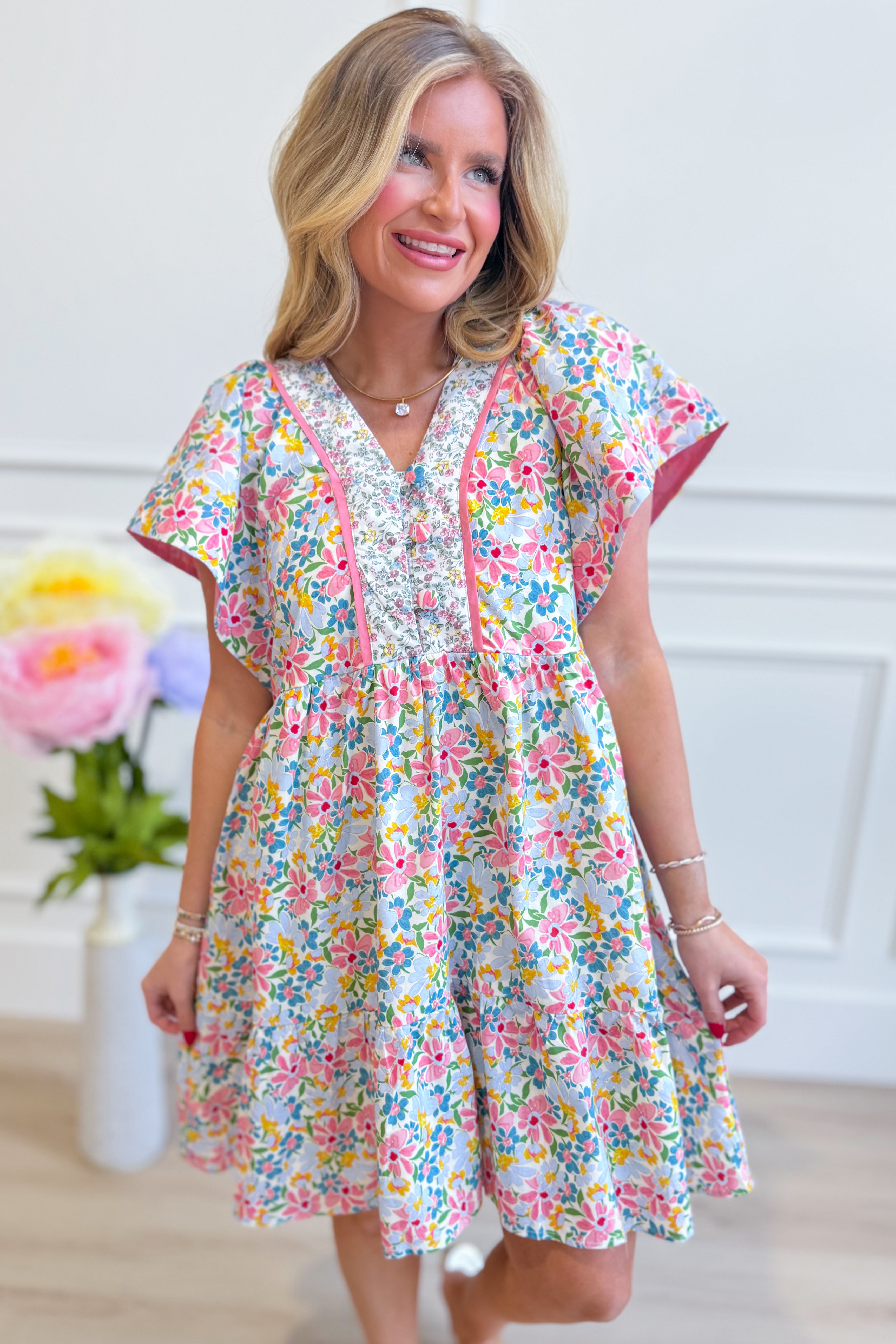 UMGEE USA Larry floral flutter sleeve dress, elegant dressy dress with vibrant floral pattern and flowy flutter sleeves.