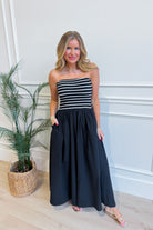 HYFVE Moana striped strapless midi dress with a fitted waist and casual style, featuring bold horizontal stripes and a flowy hem.
