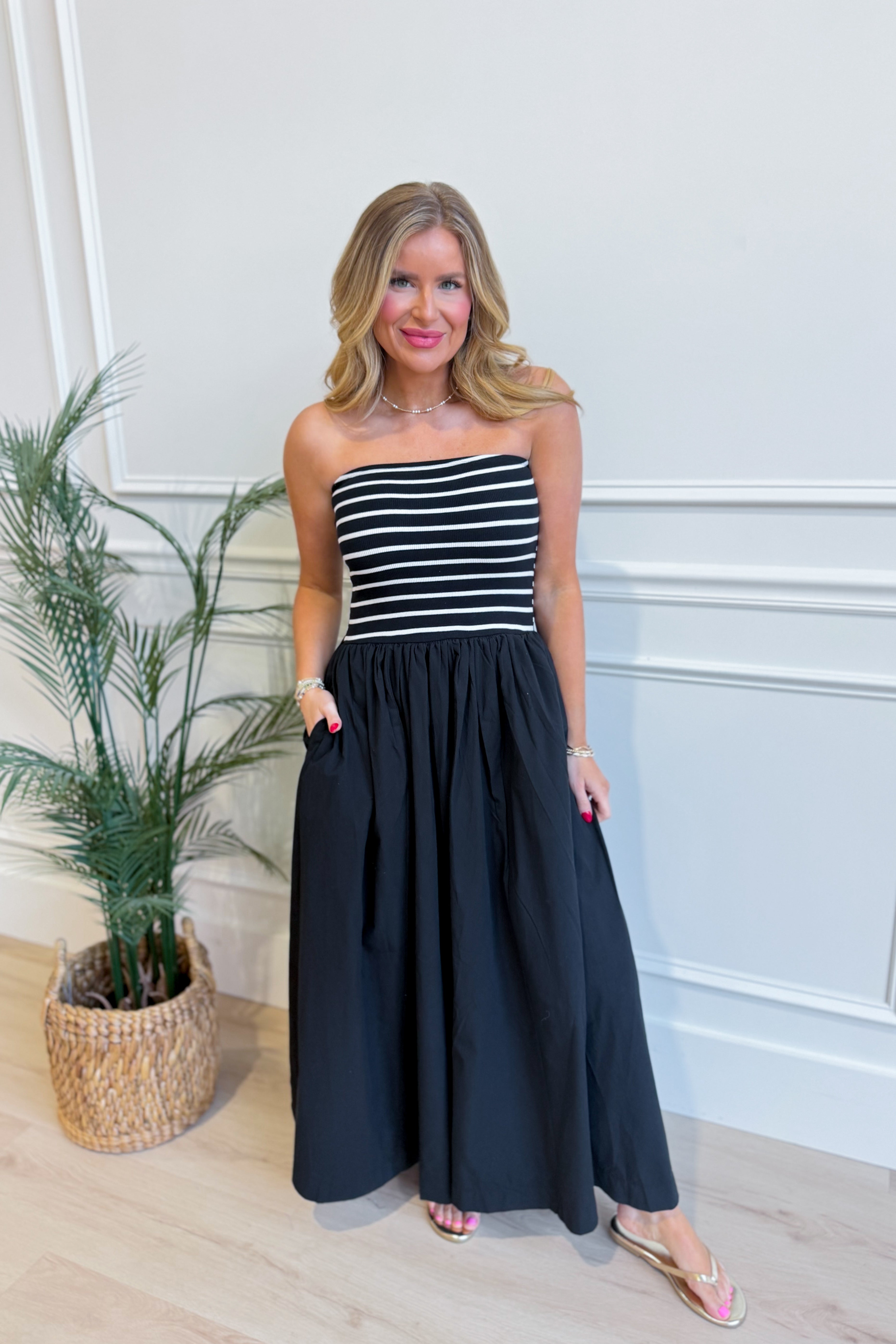 HYFVE Moana striped strapless midi dress with a fitted waist and casual style, featuring bold horizontal stripes and a flowy hem.
