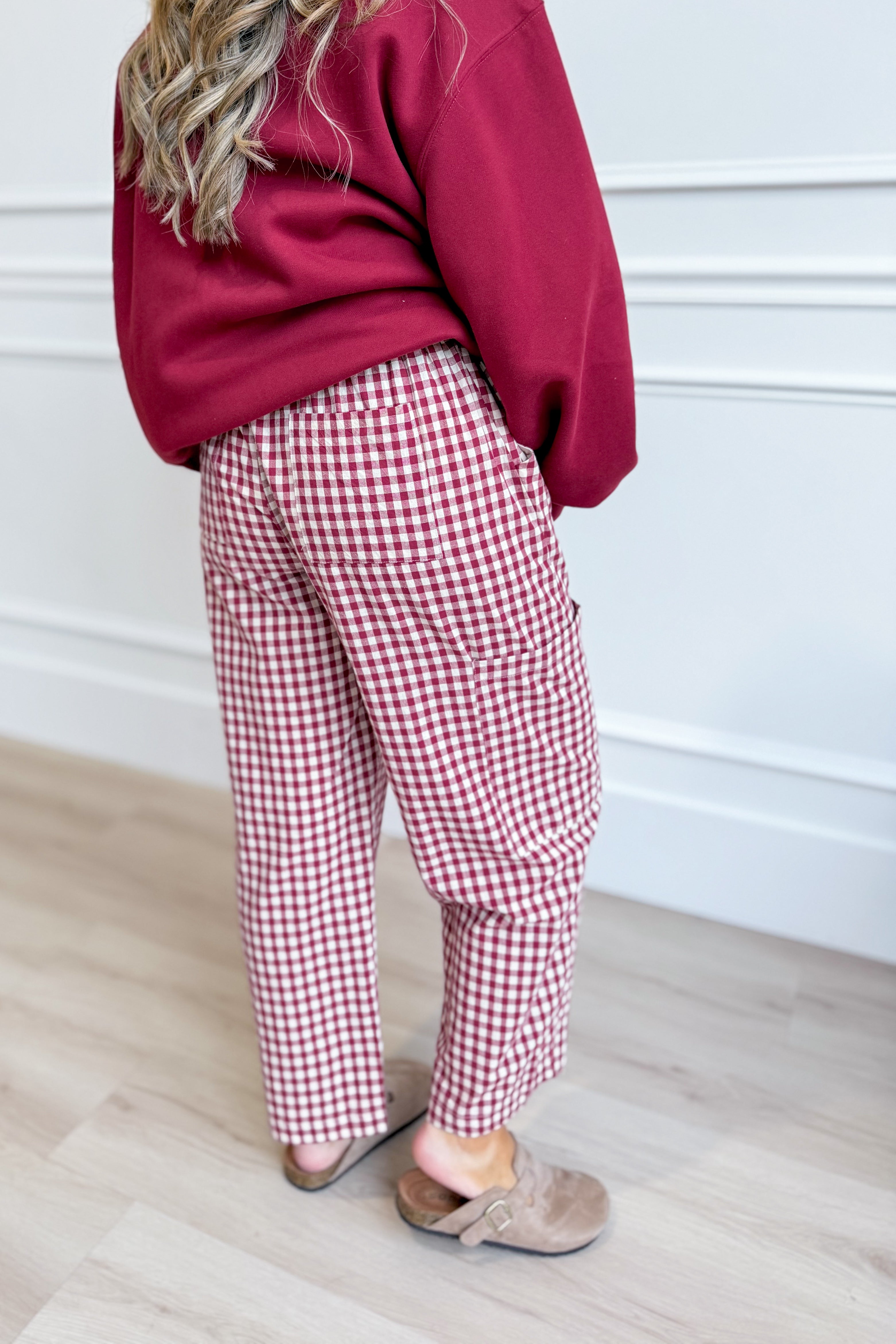 WISHLIST Rob Cherry plaid drawstring waist pants with relaxed fit and tartan pattern, featuring an adjustable waistband and tapered legs.