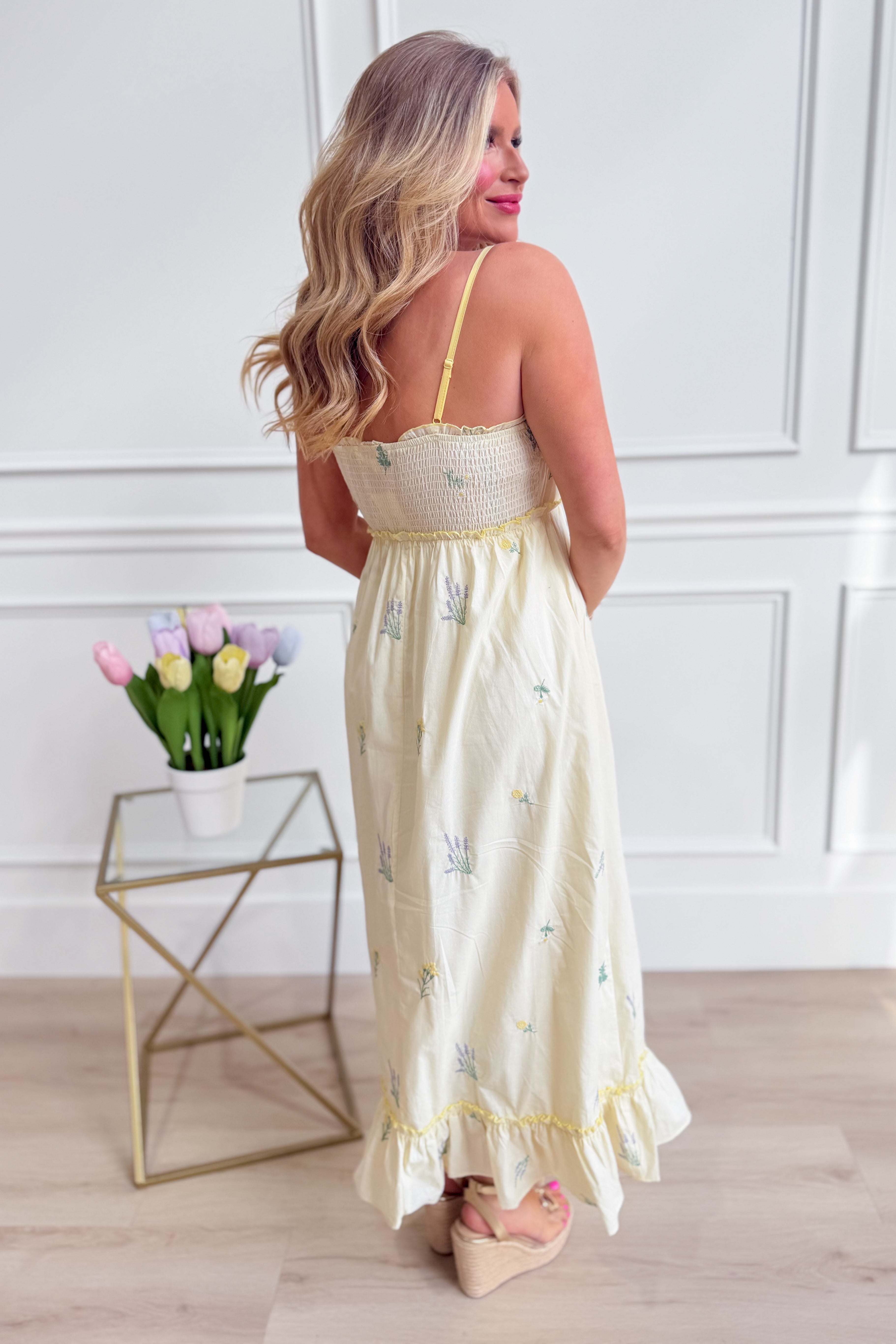 WISHLIST Avery triple bow floral midi dress featuring a flowy silhouette and vibrant floral pattern, perfect for dressy occasions.