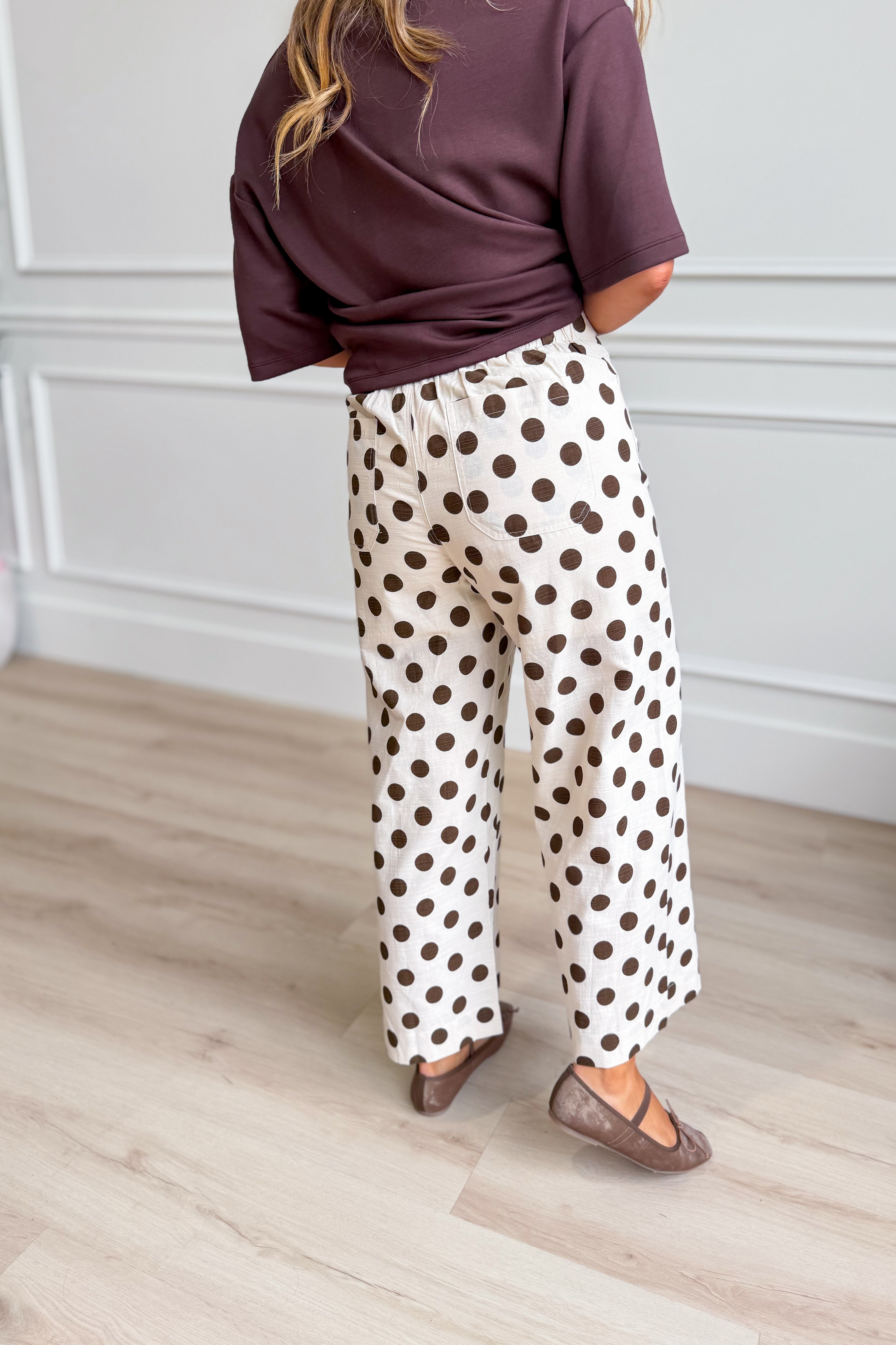 JODIFL Kelly Brown Polka Dot Wide Leg Pants from 147 Novelty Jeans, featuring a stylish polka dot pattern and wide-leg fit.