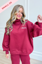 Crimson mock neck sweatshirt from BUCKET LIST's 137 Graphic Sweatshirts collection, showing the rolled neckline and soft fabric.