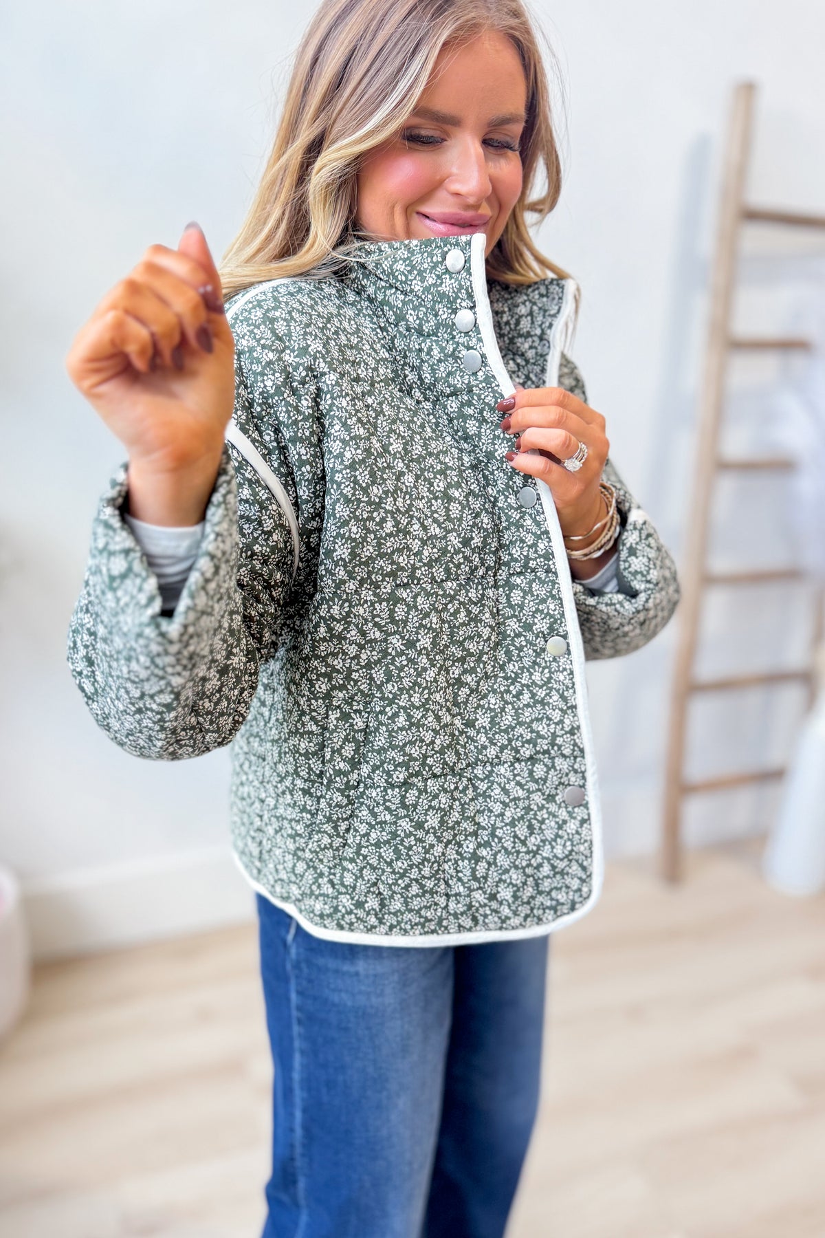 Baevly Xavier floral printed jacket, 140 outerwear with vibrant floral pattern and lightweight fabric, shown on a hanger.