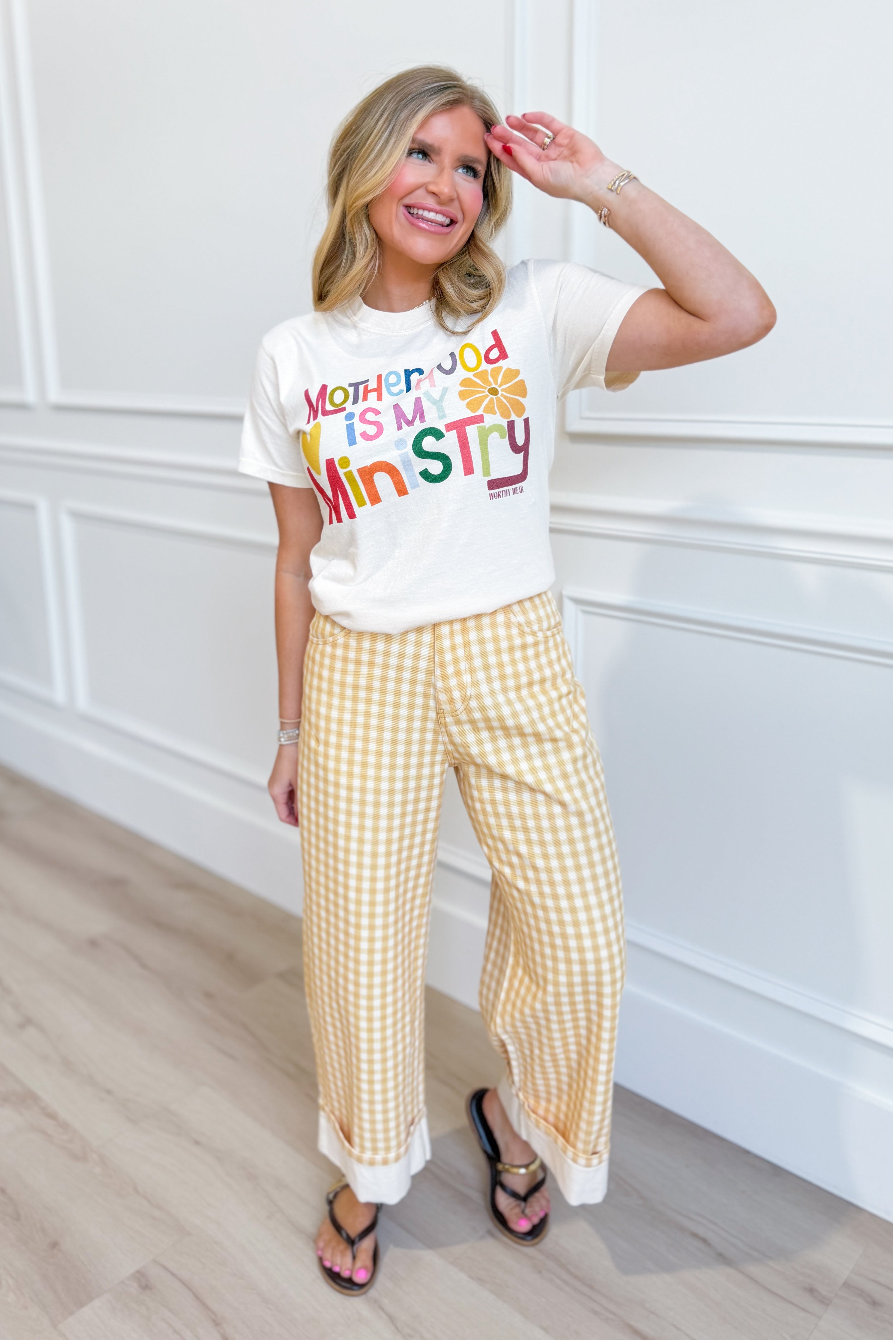 Worthy Wear Motherhood is My Ministry graphic T-shirt featuring bold text and a comfortable fit, showcasing a faith-inspired design.