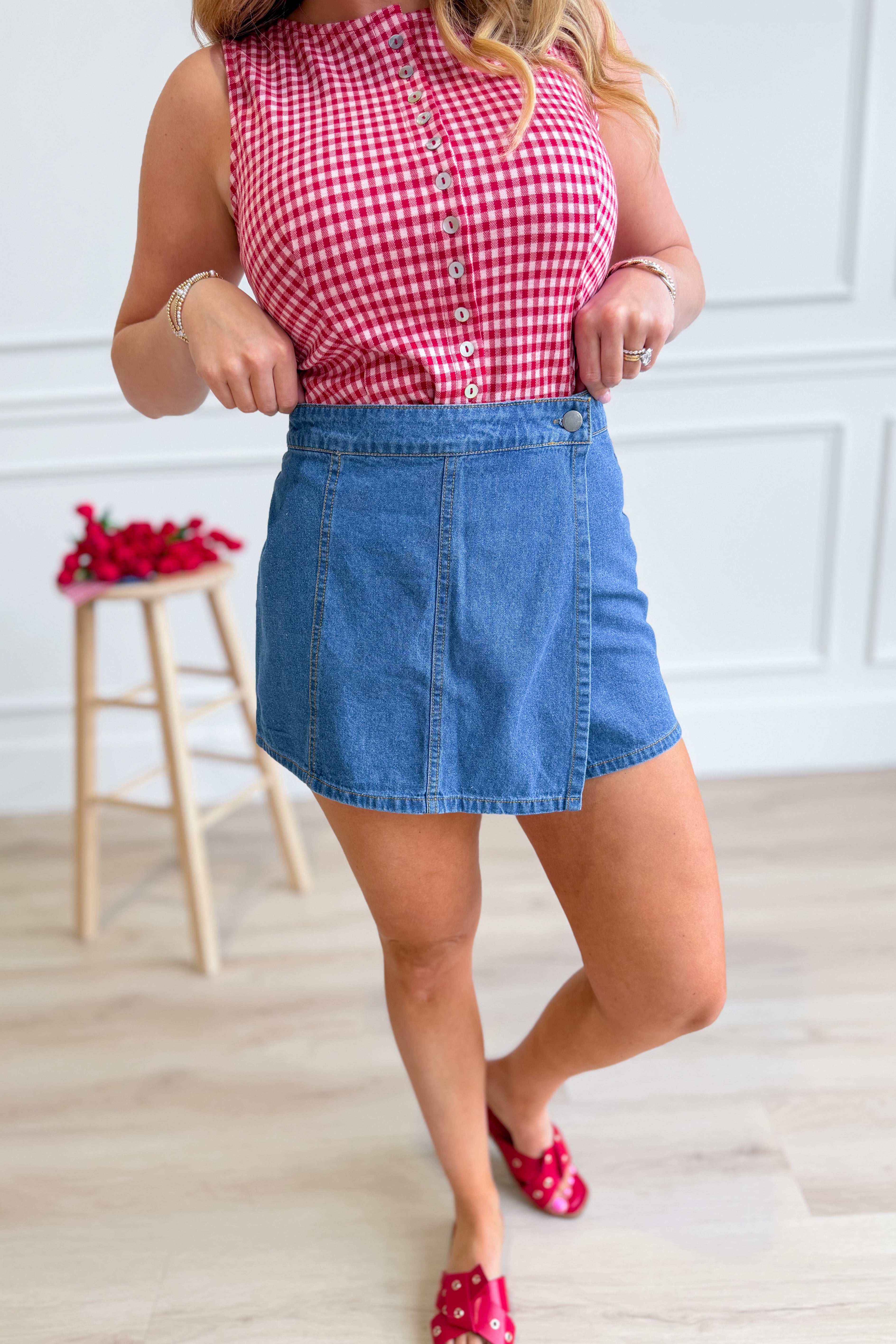 HYFVE Amy wrap front denim skirt styled with casual fit, shown in a light blue wash with front wrap design and belt loops.