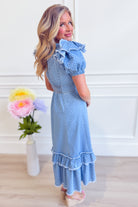 Jessica Polka Dot Bubble Sleeve Dress by PEACH LOVE, featuring a stylish dress with polka dots and bubble sleeves.
