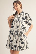 JODIFL Karen floral abstract dress with colorful print, sleeveless design, and elegant fit for dressy occasions.