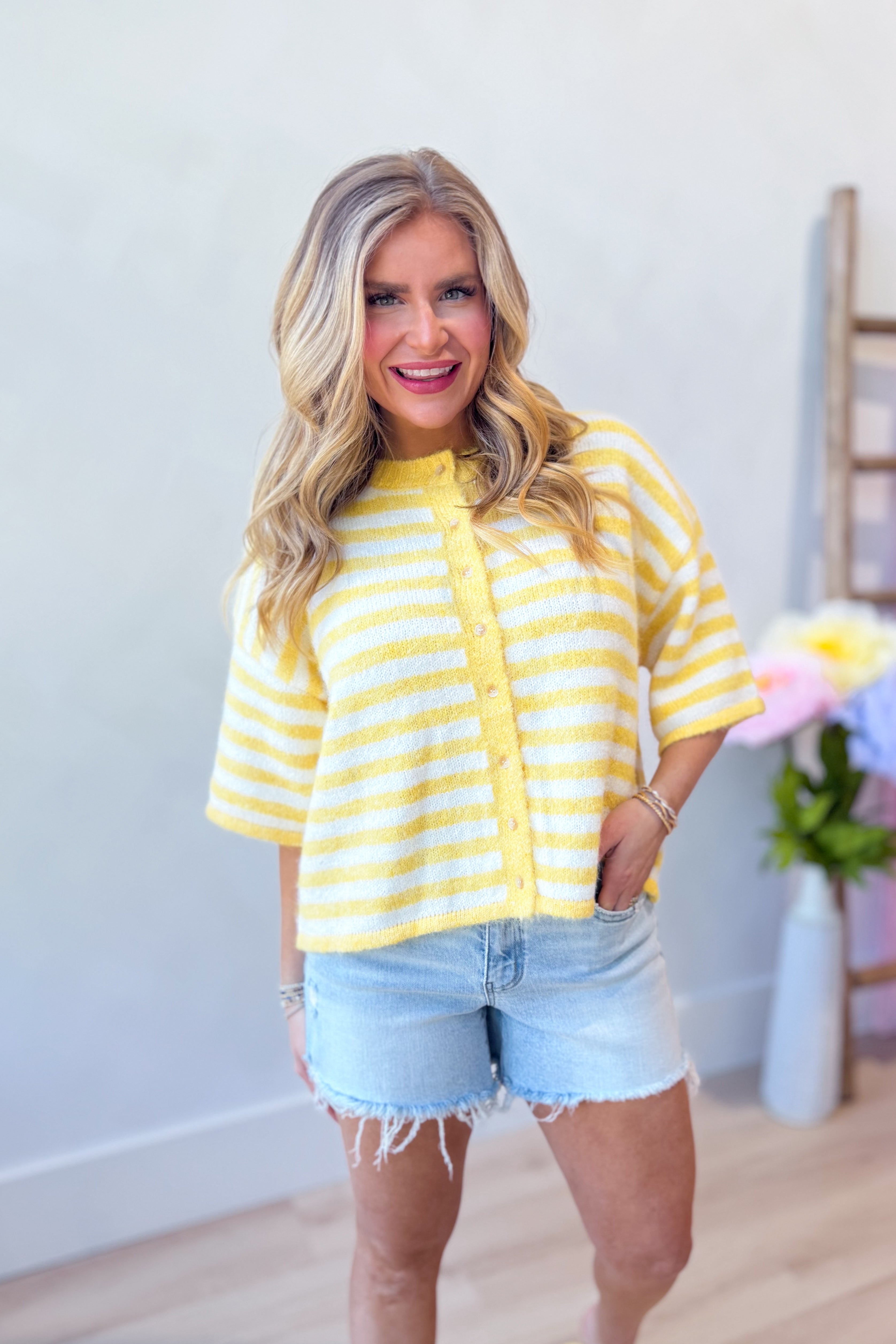 Lauren yellow striped button-down cardigan top from BAEVELY, 131 spring sweater, with yellow and white stripes and front buttons.