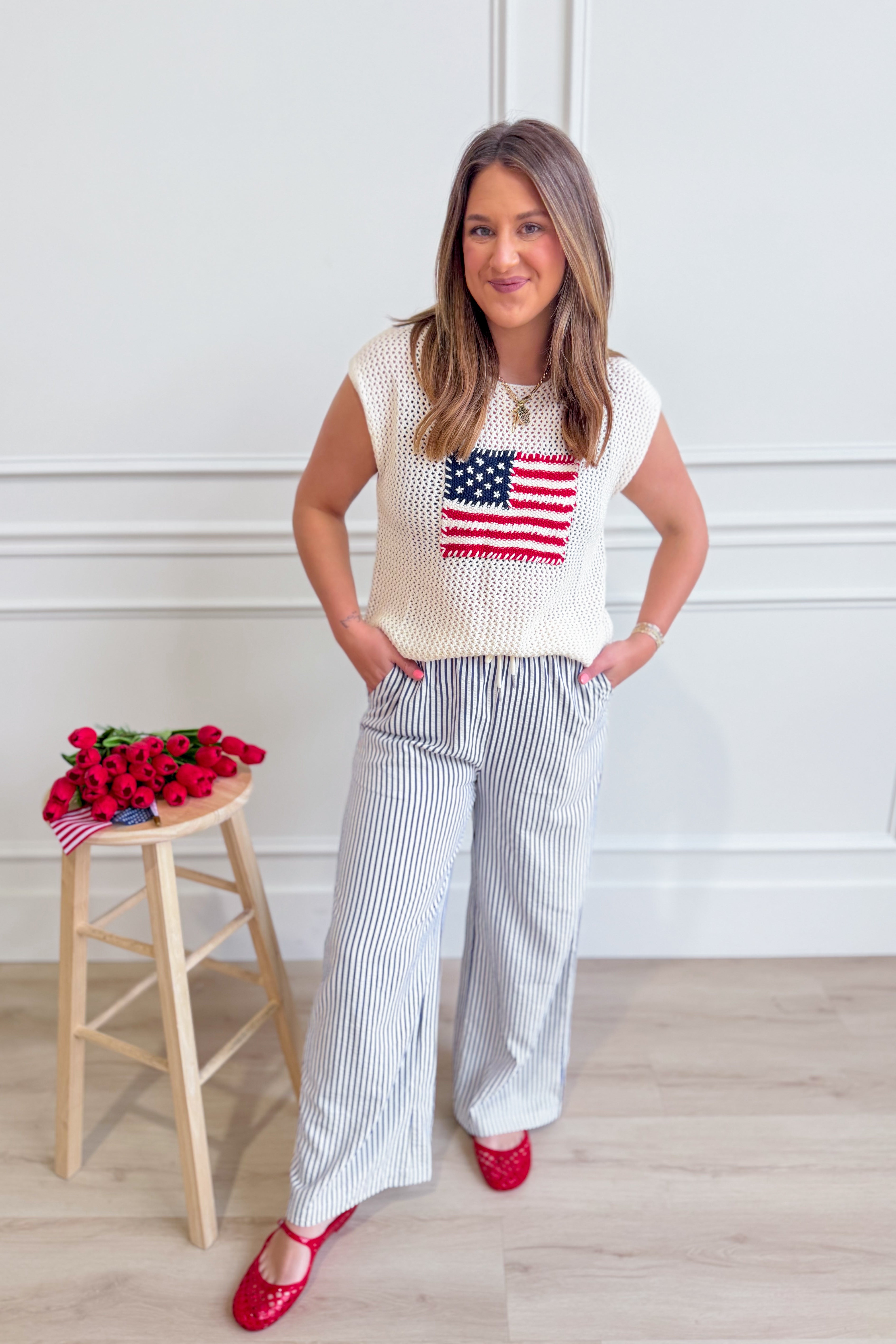 EE:SOME George USA Flag sweater top from 131 Spring Sweaters collection, featuring a patriotic USA flag design on a cozy knit.