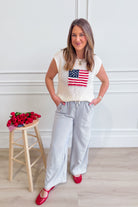EE:SOME George USA Flag sweater top from 131 Spring Sweaters collection, featuring a patriotic USA flag design on a cozy knit.