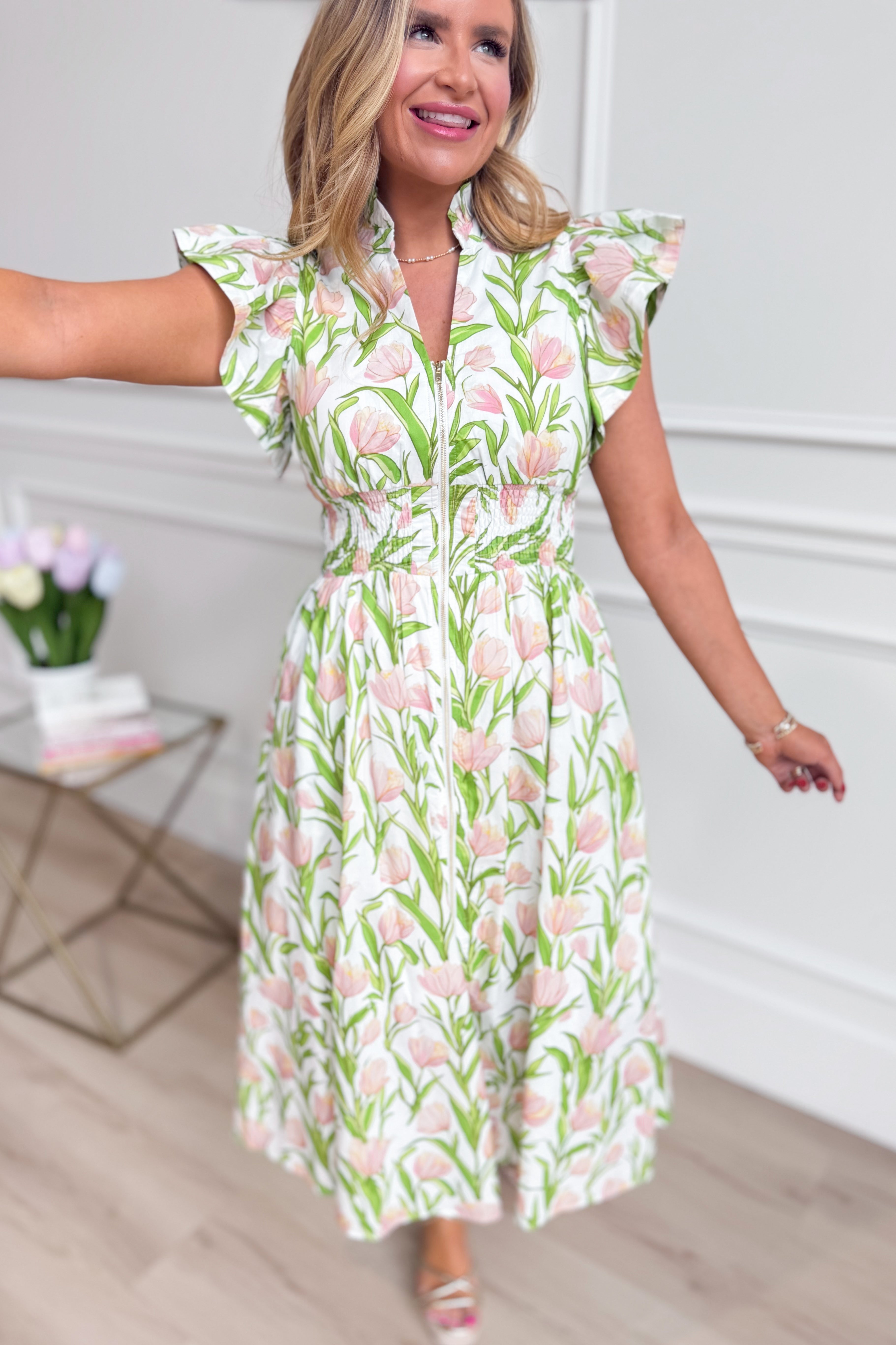 ENTRO Carson botanical floral printed dress featuring a flowy silhouette and vibrant floral pattern, perfect for dressy occasions.