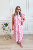 ENTRO Aubrey pink floral flutter sleeve dress with a flowing silhouette, perfect for dressy occasions.