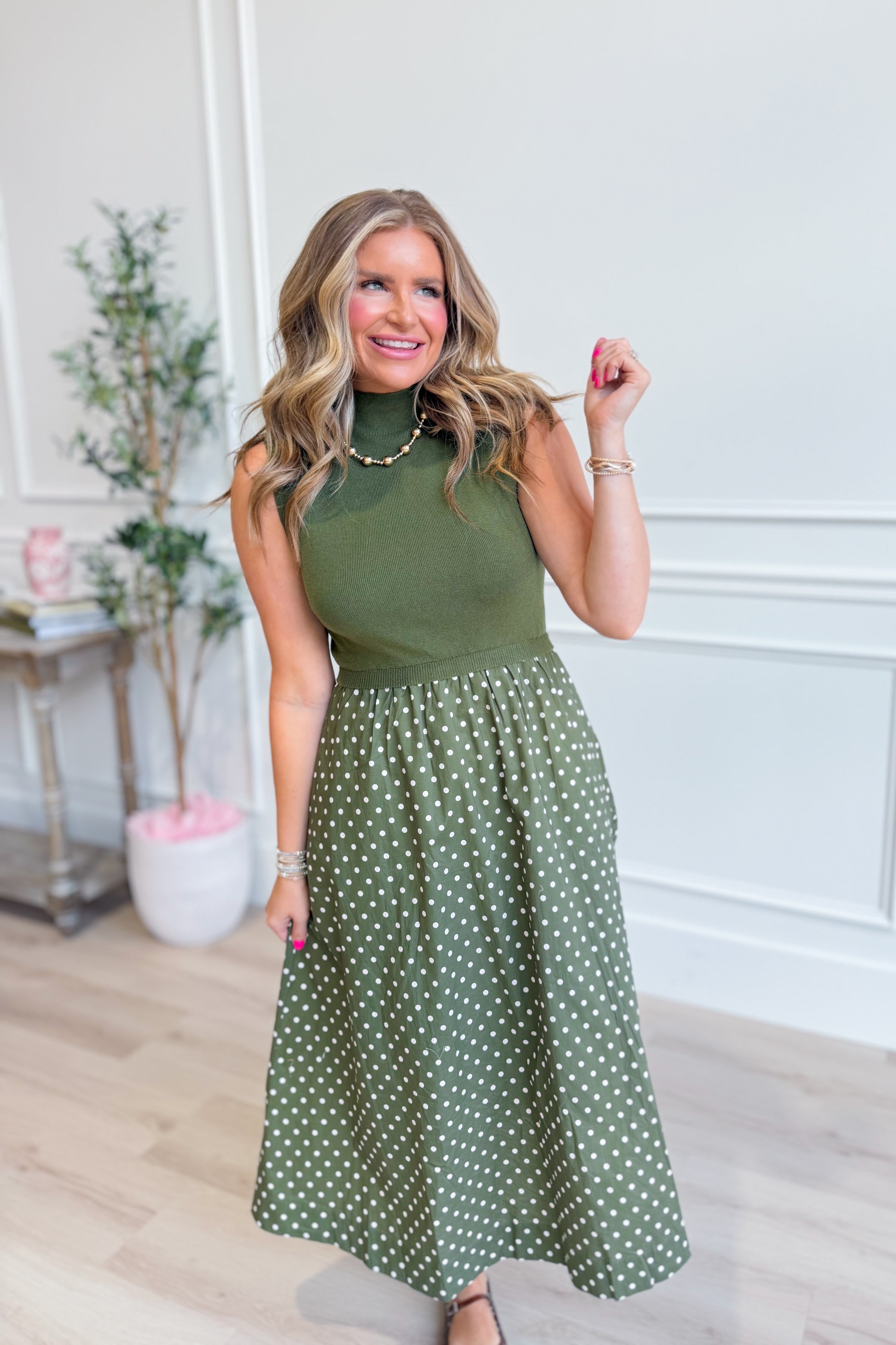ENTRO Laurel midi dress with polka dot print, featuring a stylish dressy design and a flattering fit, perfect for semi-formal occasions