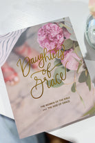 Daughters of Grace Bible Study book by THE DAILY GRACE CO, featuring a close-up of the cover with elegant design elements.