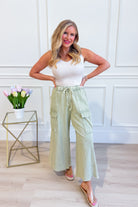 EASEL Mateo mineral washed wide leg cargo pants, 156 Pants, showing relaxed fit, beige color, and large side pockets.