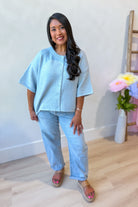 Baevly Lauren button-down cardigan top in a 131 spring sweater style, featuring a classic knit design and button details.