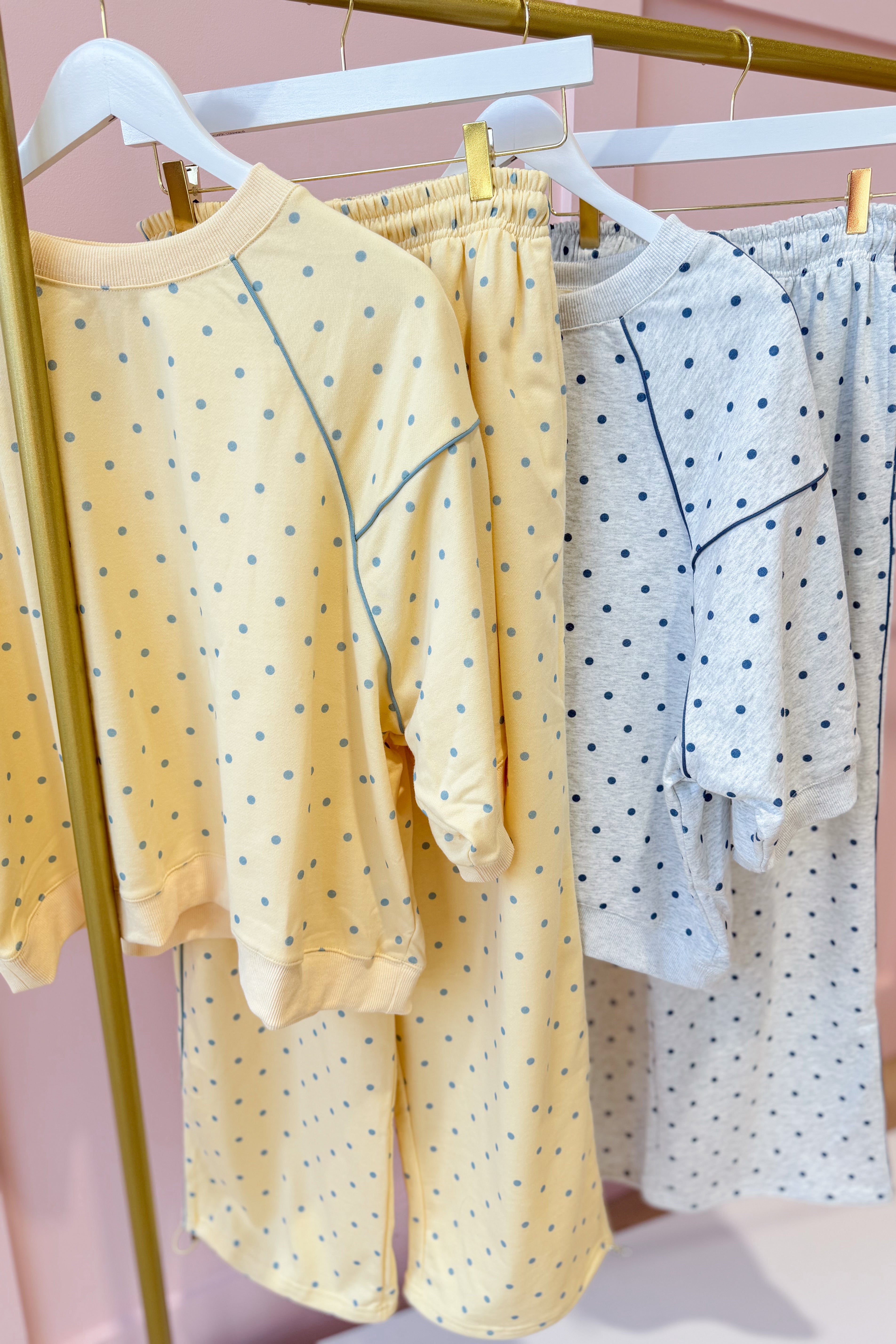 Frederick Butter Yellow Polka Dot French Terry Track Pant by PEACH LOVE, featuring yellow fabric with white polka dots and elastic waistband