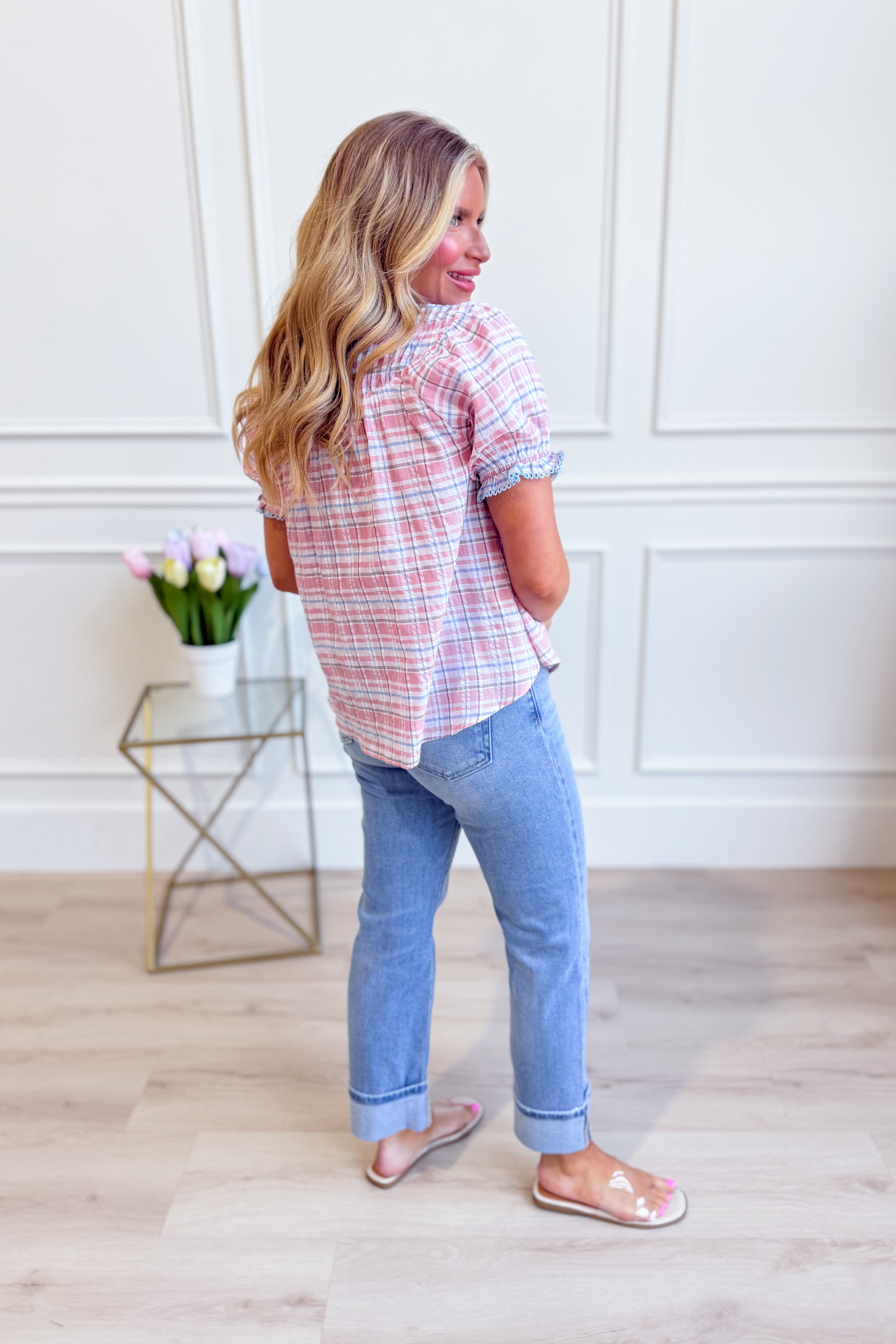 Petunia plaid button-down blouse by EE:SOME, a stylish dressy top with a classic checkered pattern and collar detail.