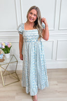 IN LOOM French floral cotton maxi dress with a flowing silhouette and vibrant flower print, perfect for elegant occasions.