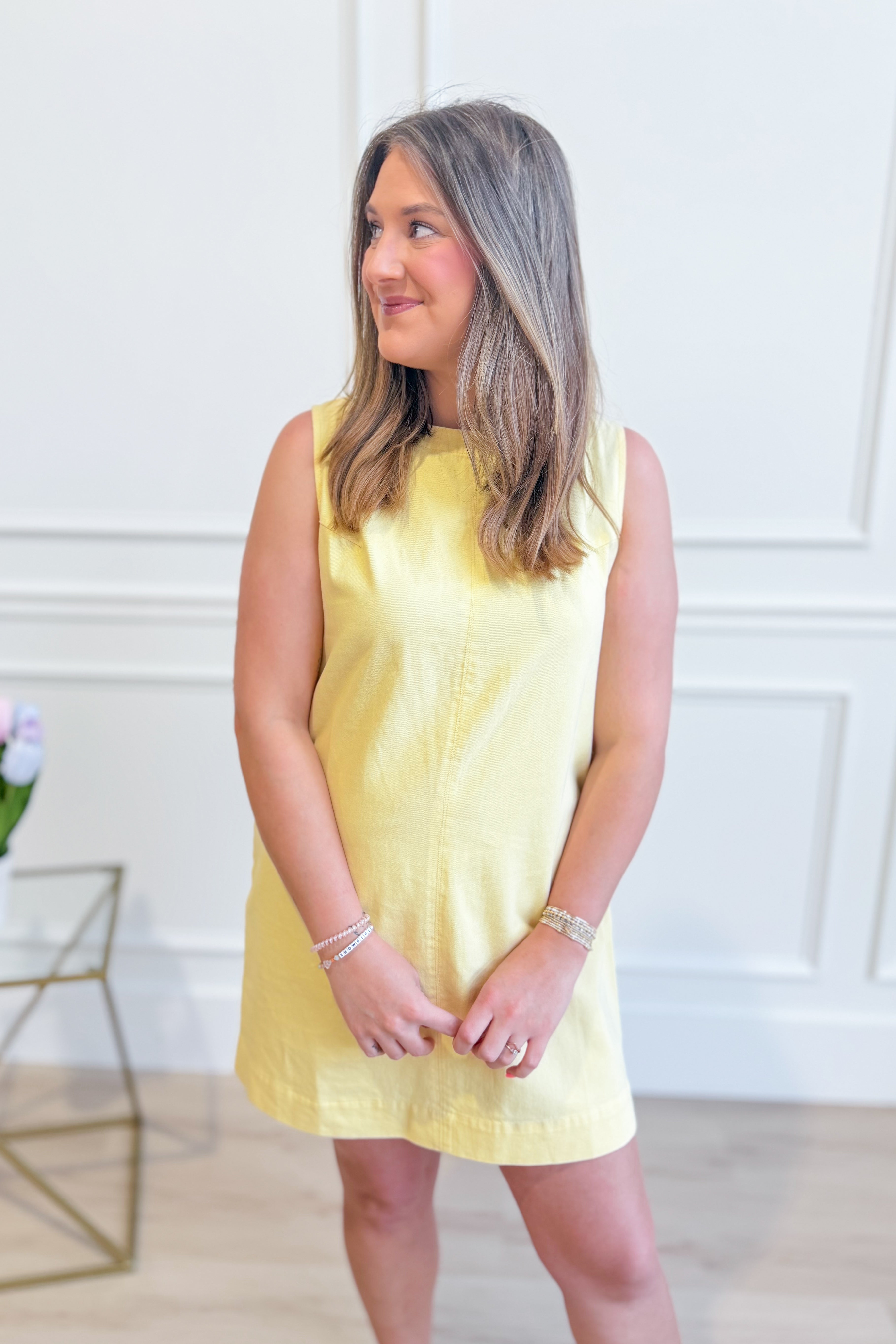 EE:SOME Josie sleeveless casual dress in a light fabric, featuring a relaxed fit and simple design perfect for warm weather.