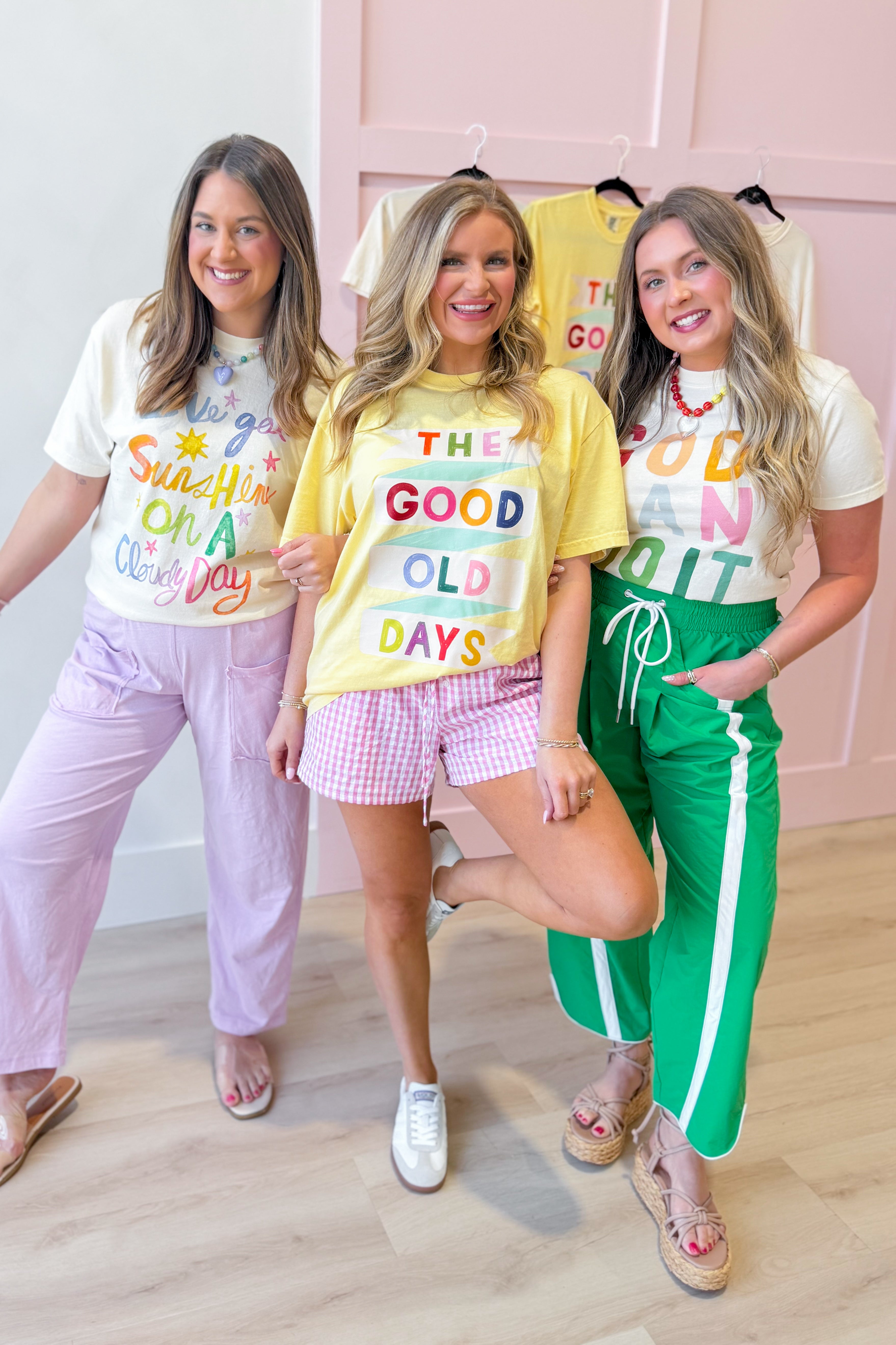 Poppy & Pine God Can Do It graphic T-shirt featuring bold text and a simple design on a casual black tee.